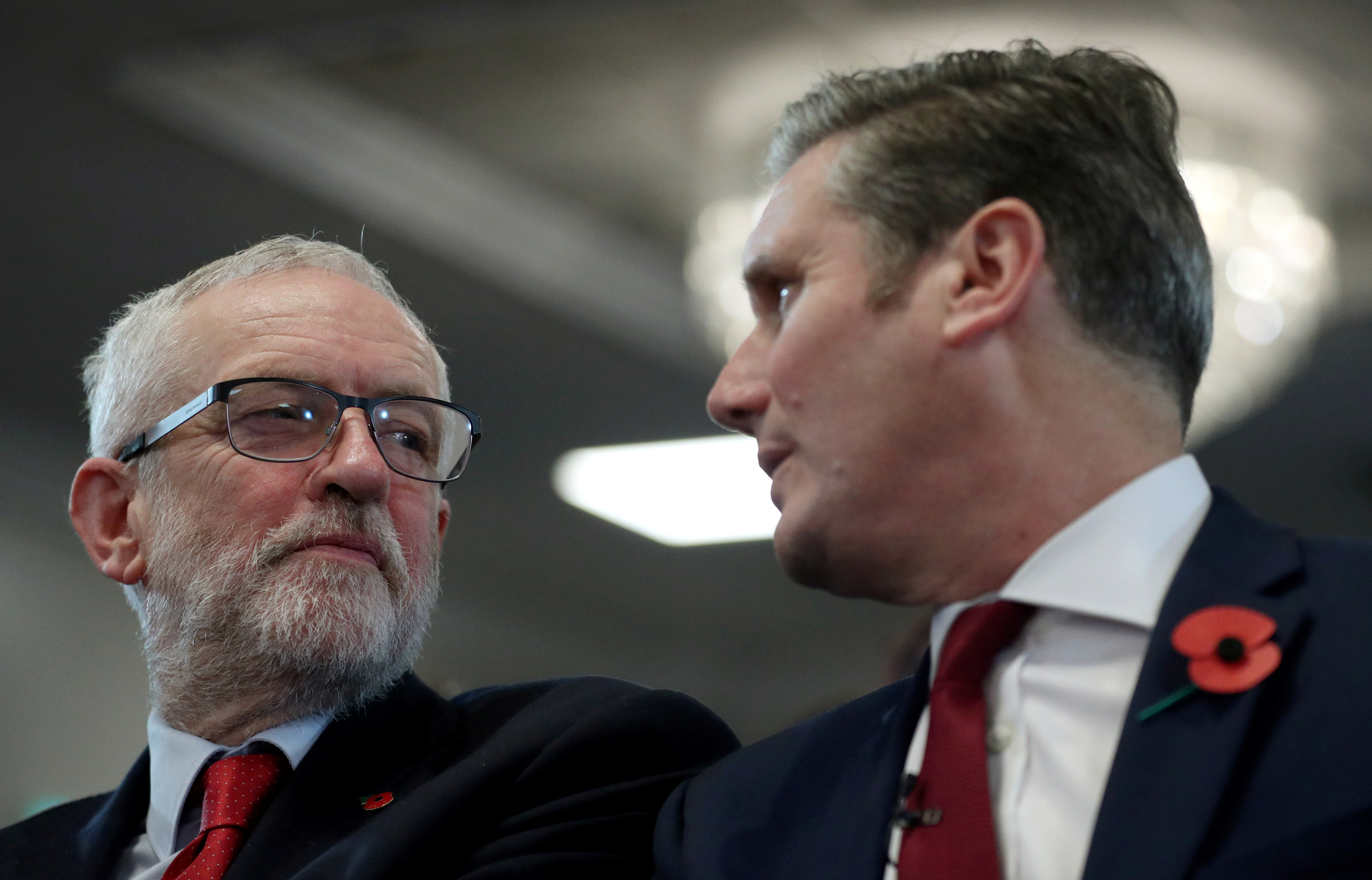 Former Labour Party leader Jeremy Corbyn and his successor Keir Starmer attend a general election campaign meeting in Harlow, Britain, on November 5, 2019 [Hannah McKay/Reuters]