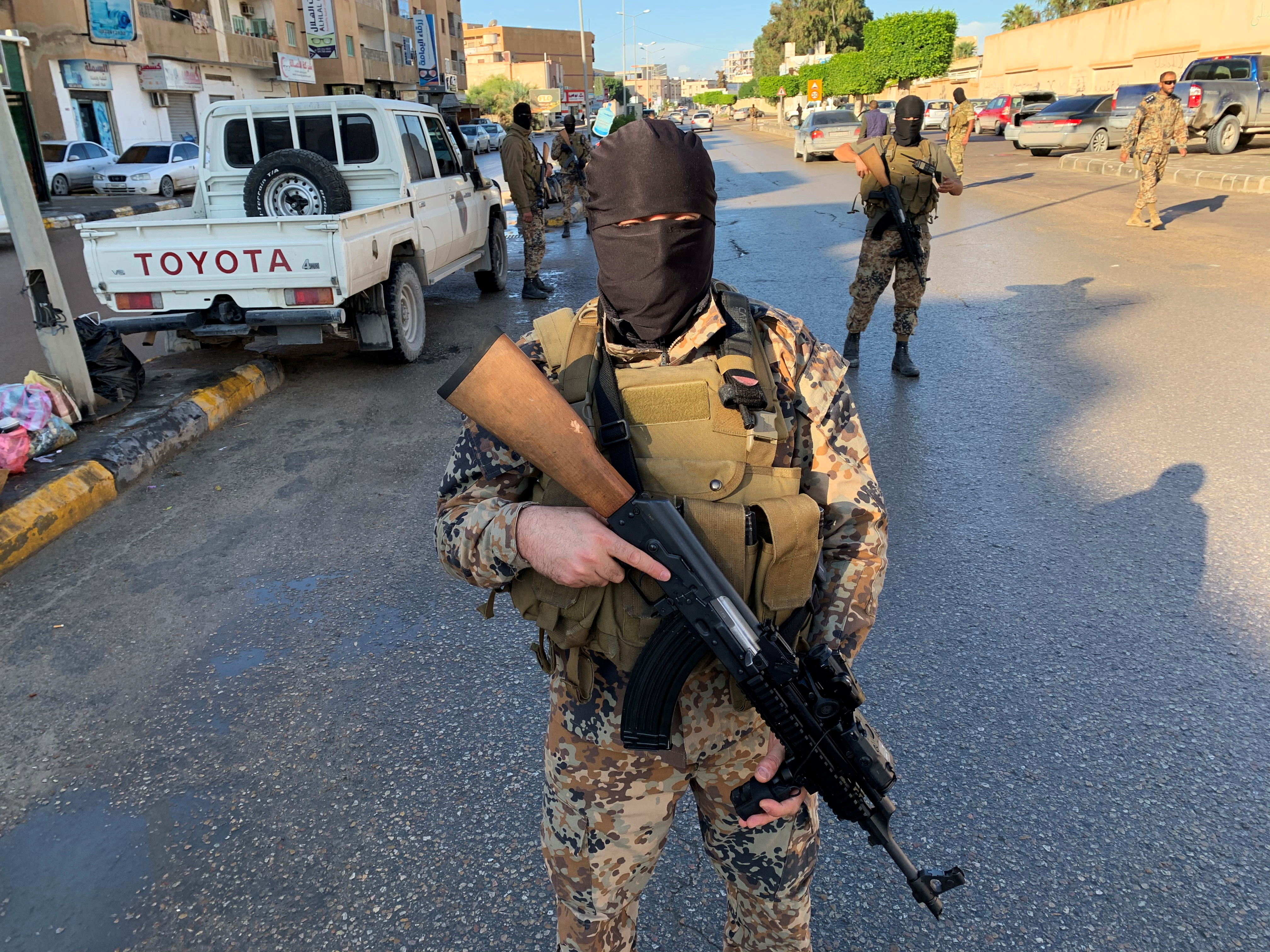 A member of the Libyan security forces holds a rifle in Misrata