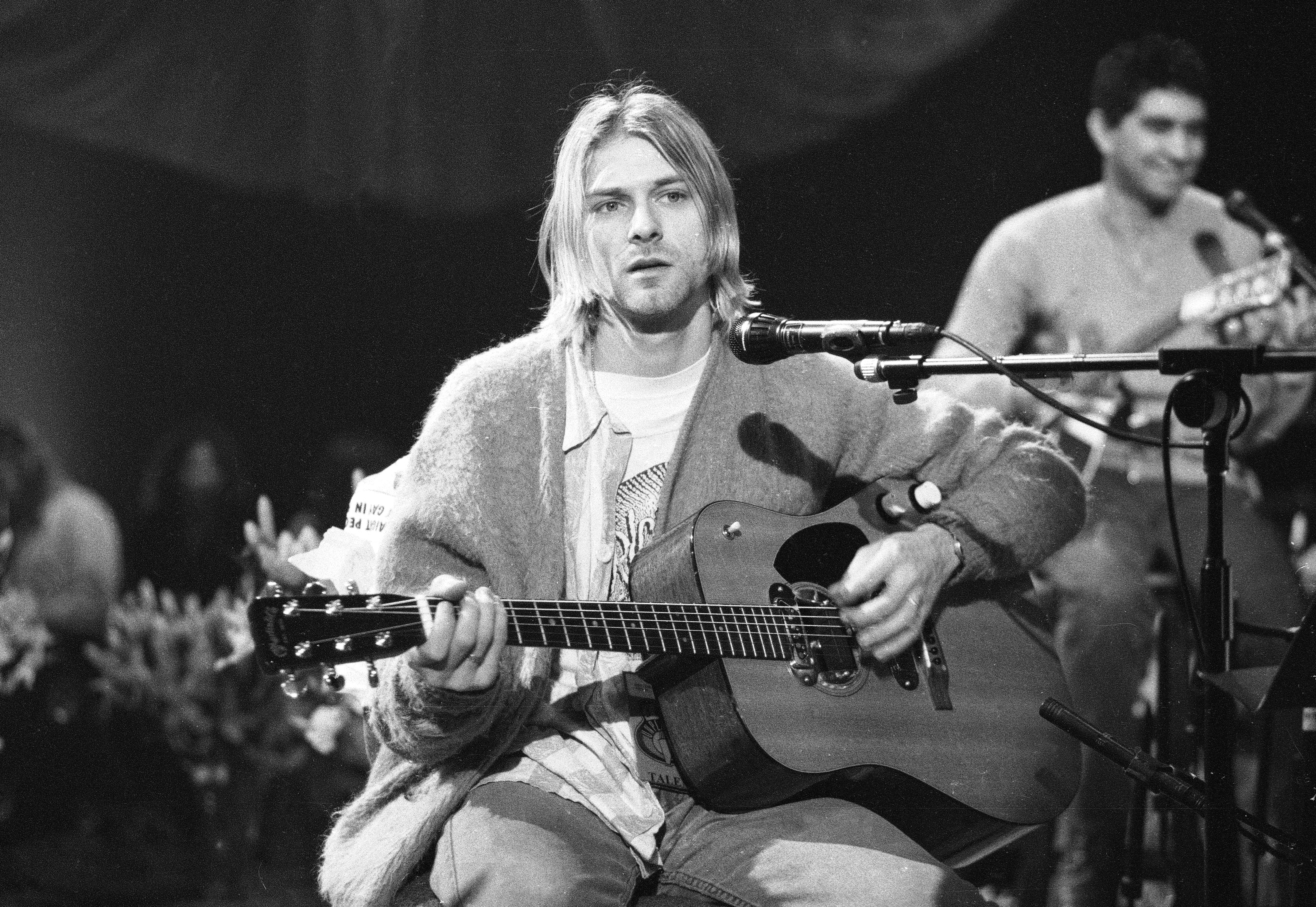 American singer and guitarist Kurt Cobain (1967 - 1994), performs with his group Nirvana at a taping of the television program 'MTV Unplugged', New York, New York, November 18, 1993 [Photo by Frank Micelotta/Getty Images]