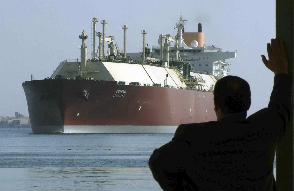 A man looks as the world's biggest Liquefied Natural Gas (LNG) tanker DUHAIL