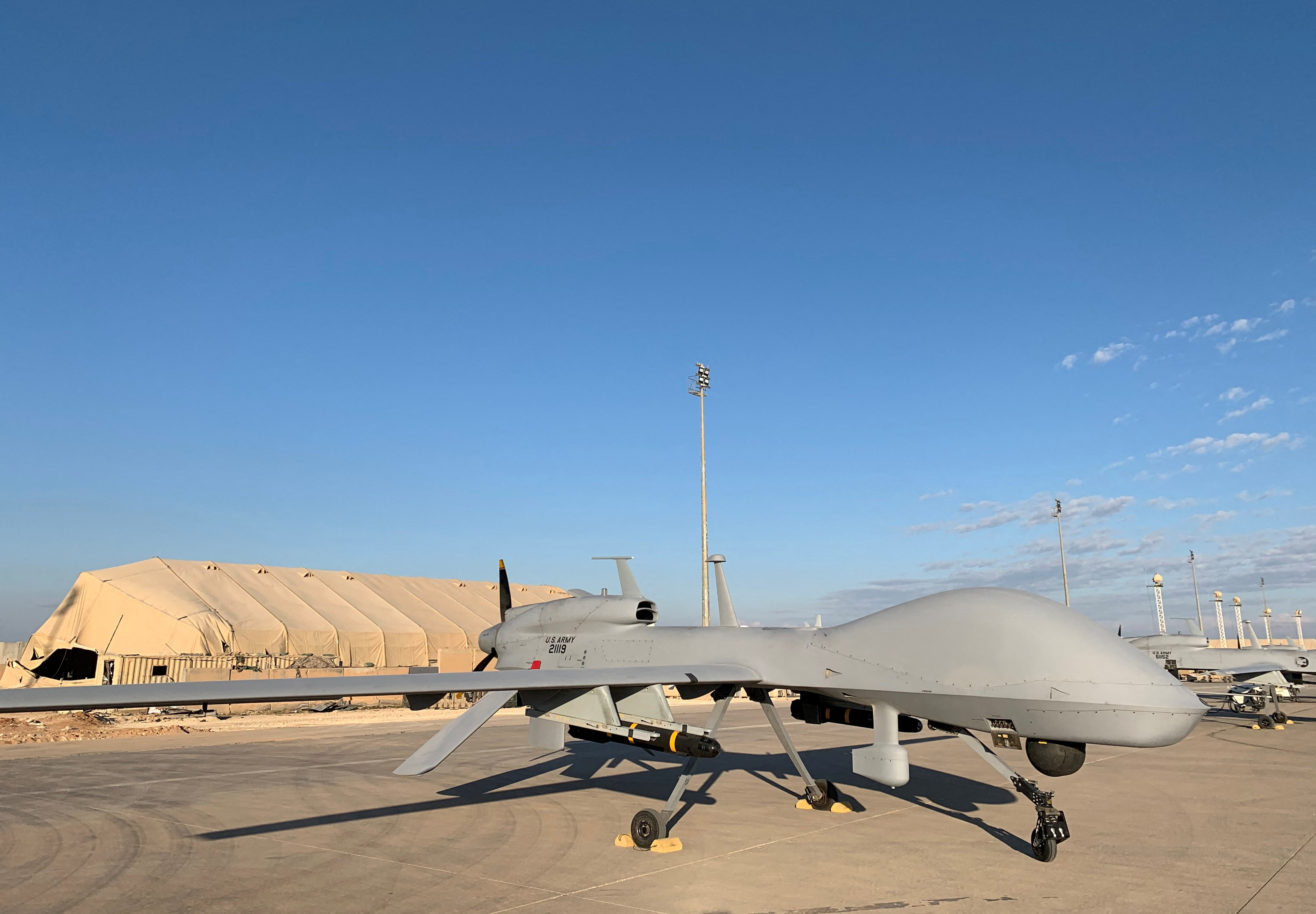 A picture taken on January 13, 2020, during a press tour organised by the US-led coalition fighting the remnants of the Islamic State group, shows US army drones at the Ain al-Asad