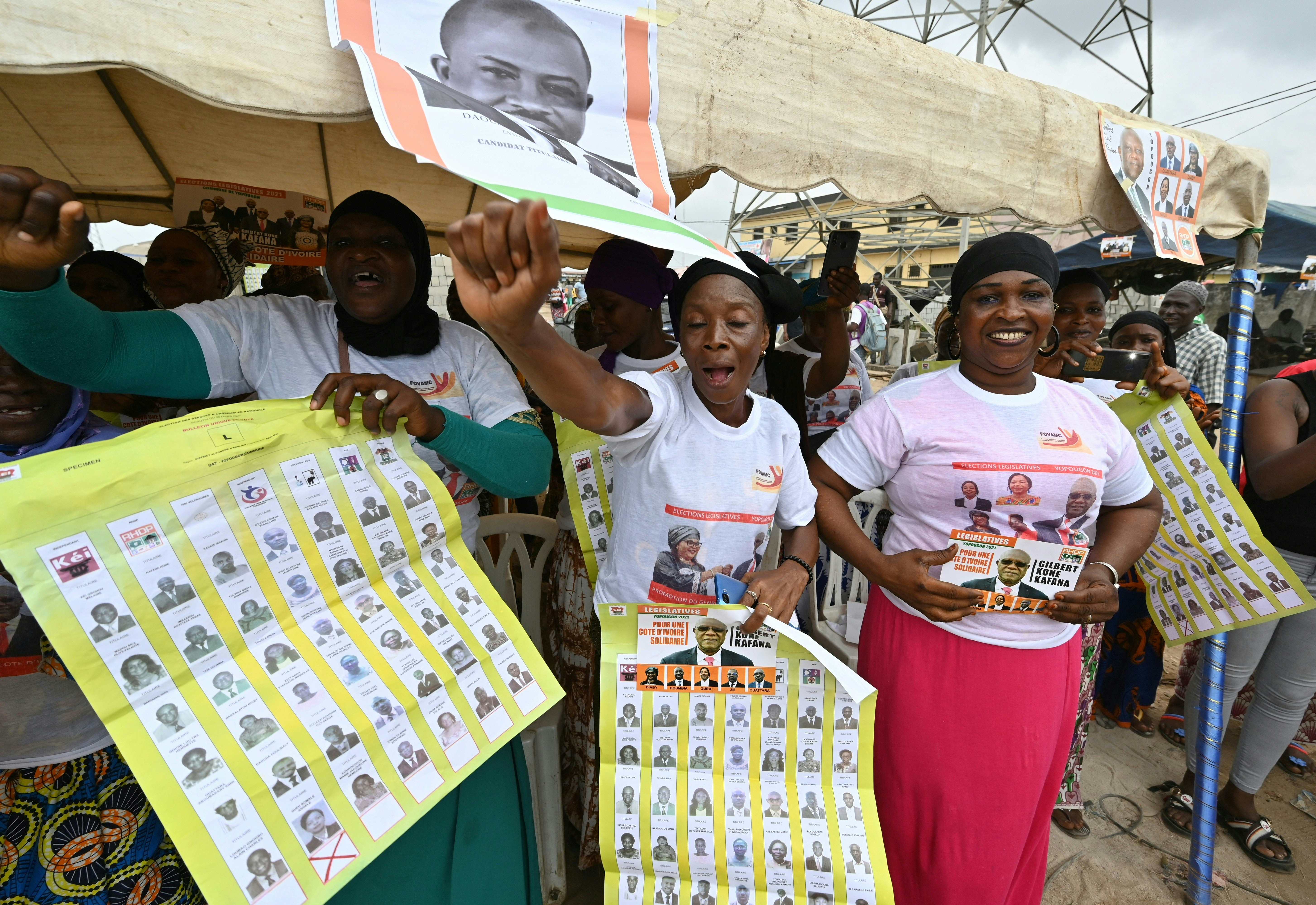 Women take part in Ivory Coast's parliamentary election campaign rally in the popular district of Yopougon, a suburb in Abidjan [File: Issouf Sanogo/AFP]