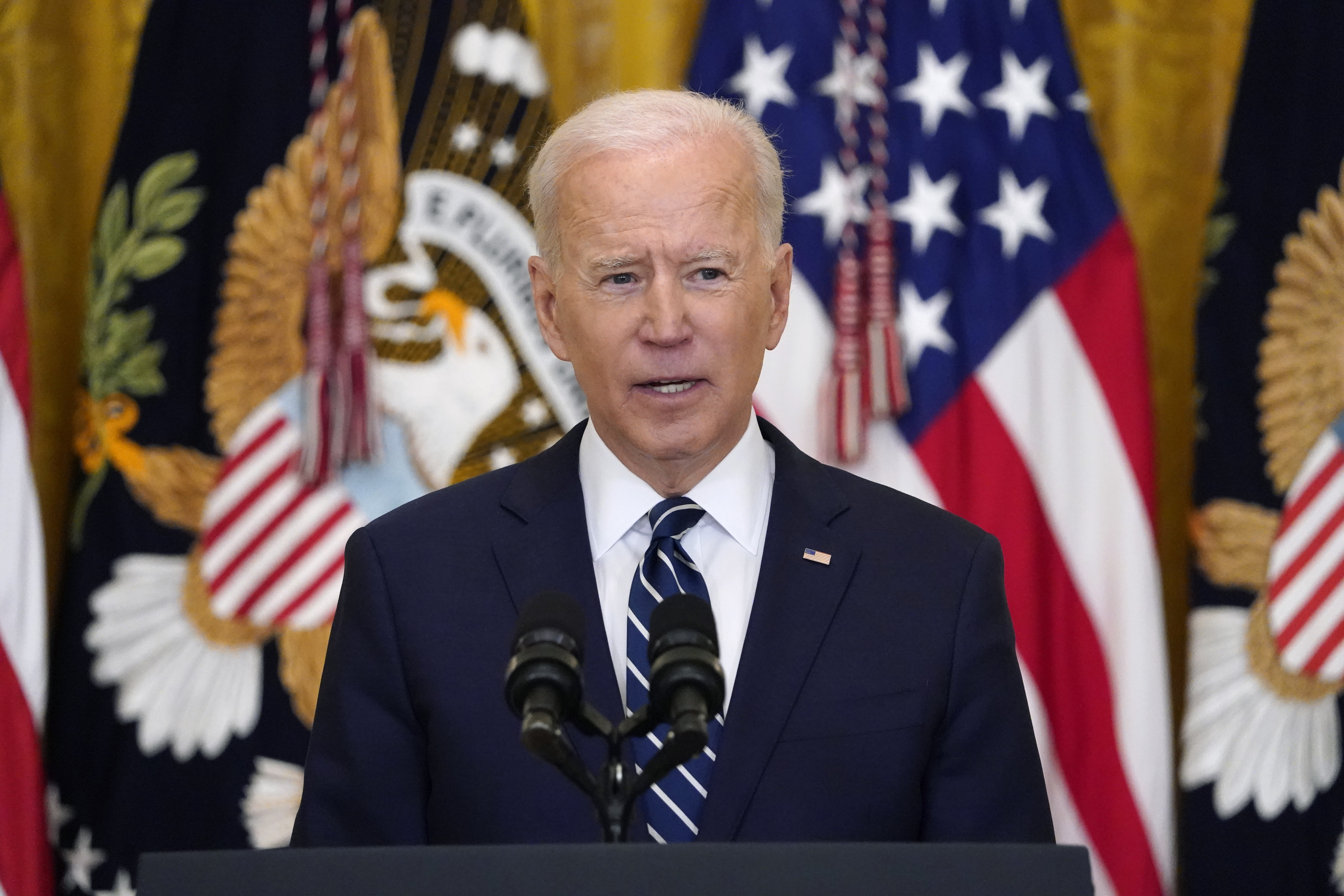 President Joe Biden speaks during his first news conference in the East Room of the White House [Evan Vucci/AP Photo]