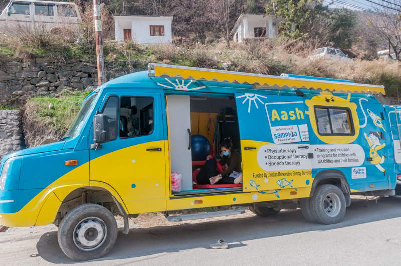 The Therapy on Wheels bus visits remote Indian regions to provide therapy to children with developmental disabilities [Shail Desai/AL JAZEERA]