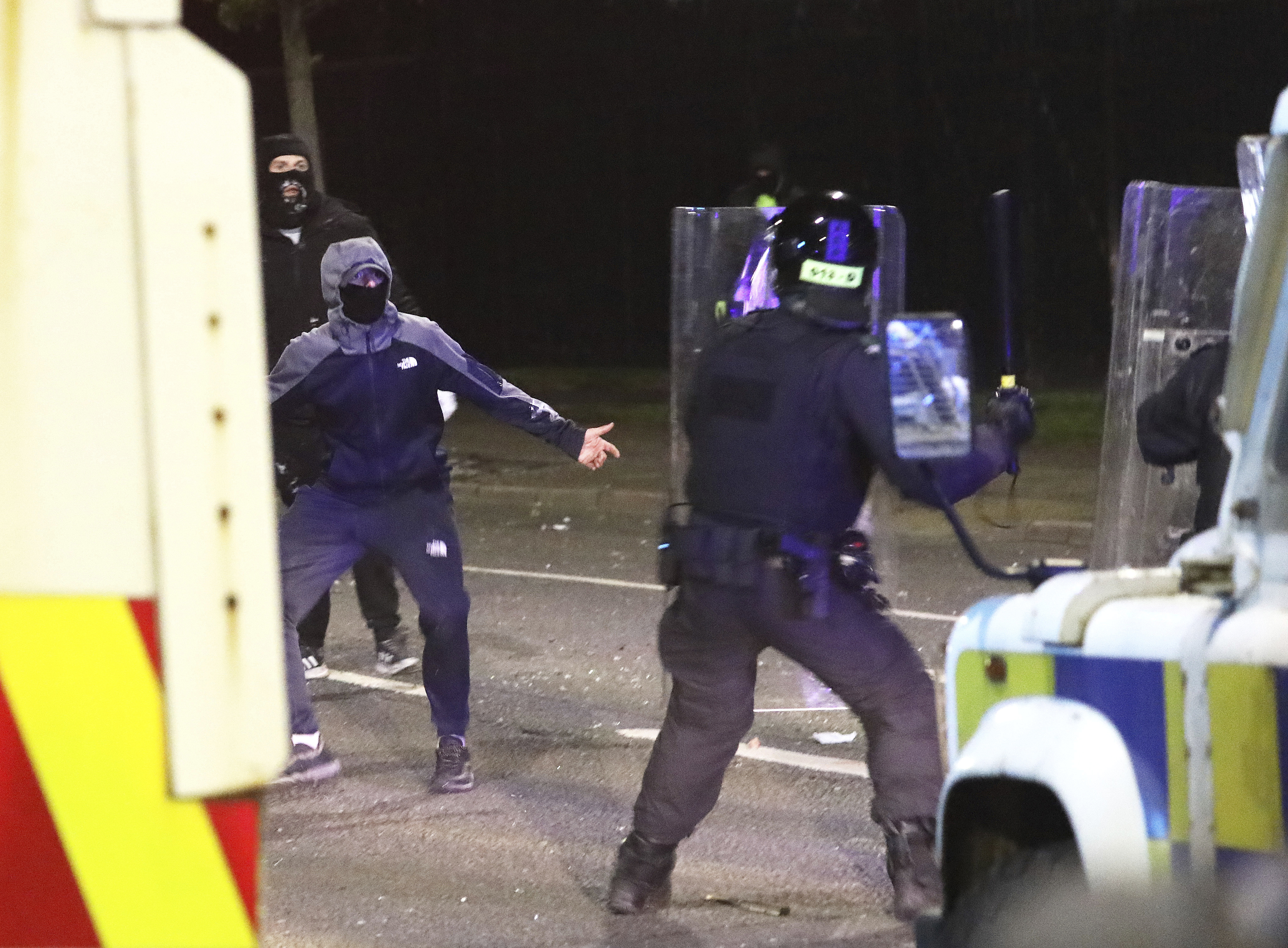 Loyalist rioters attack police in the Tigers Bay Area of north Belfast, Northern Ireland, Friday, April 9, 2021 [Peter Morrison/AP]