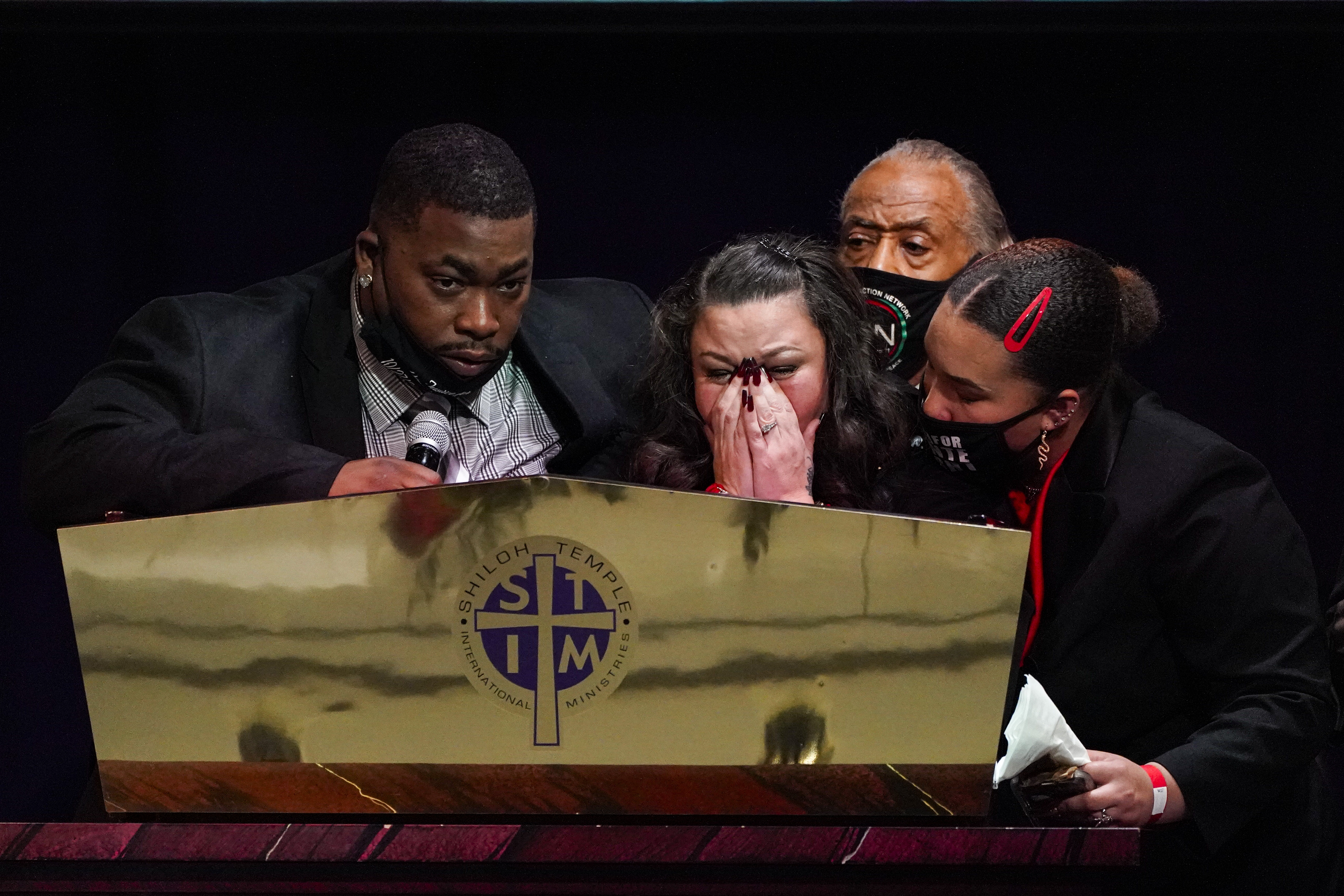 Katie and Aubrey Wright, parents of Daunte Wright, cry as they speak during funeral services of Daunte Wright at Shiloh Temple International Ministries in Minneapolis, Thursday, April 22, 2021 [Julio Cortez/Pool via AP]