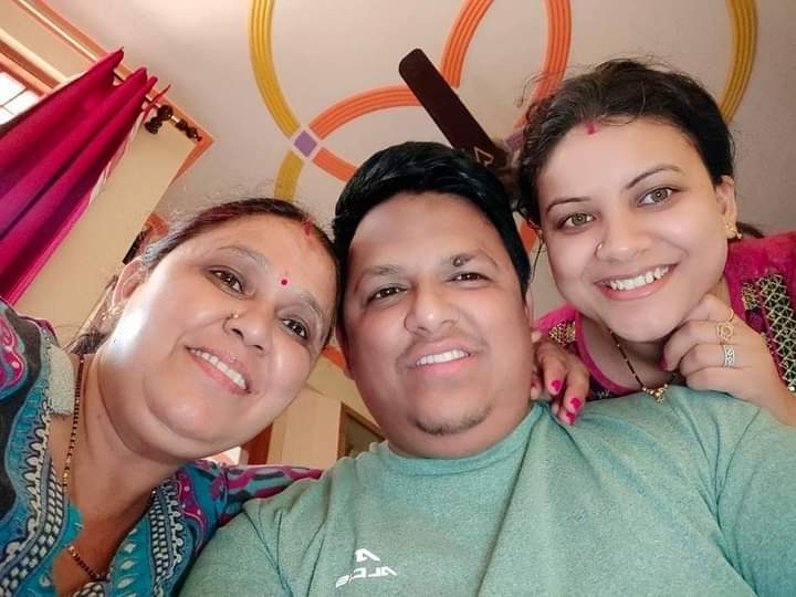 Pradeep Gusain, 29, with his wife, Karishma, and his mother, Bimla Devi, before his death from COVID-19 in April [Photo courtesy of the Gusain family]