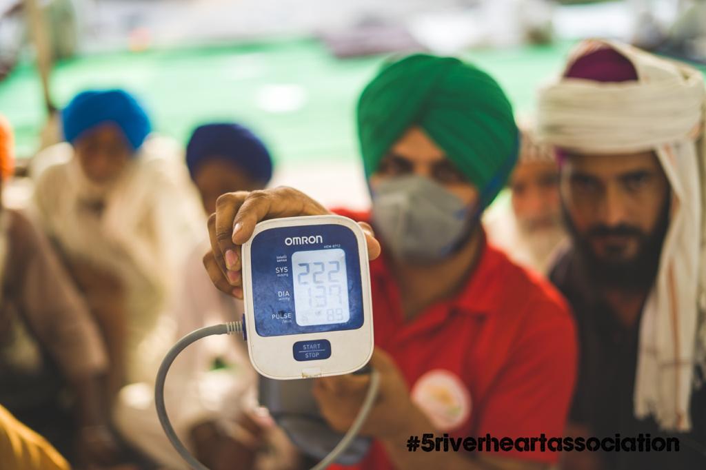 Singh with protesting farmers at Tikri outside New Delhi [Courtesy: Dr Swaiman Singh]