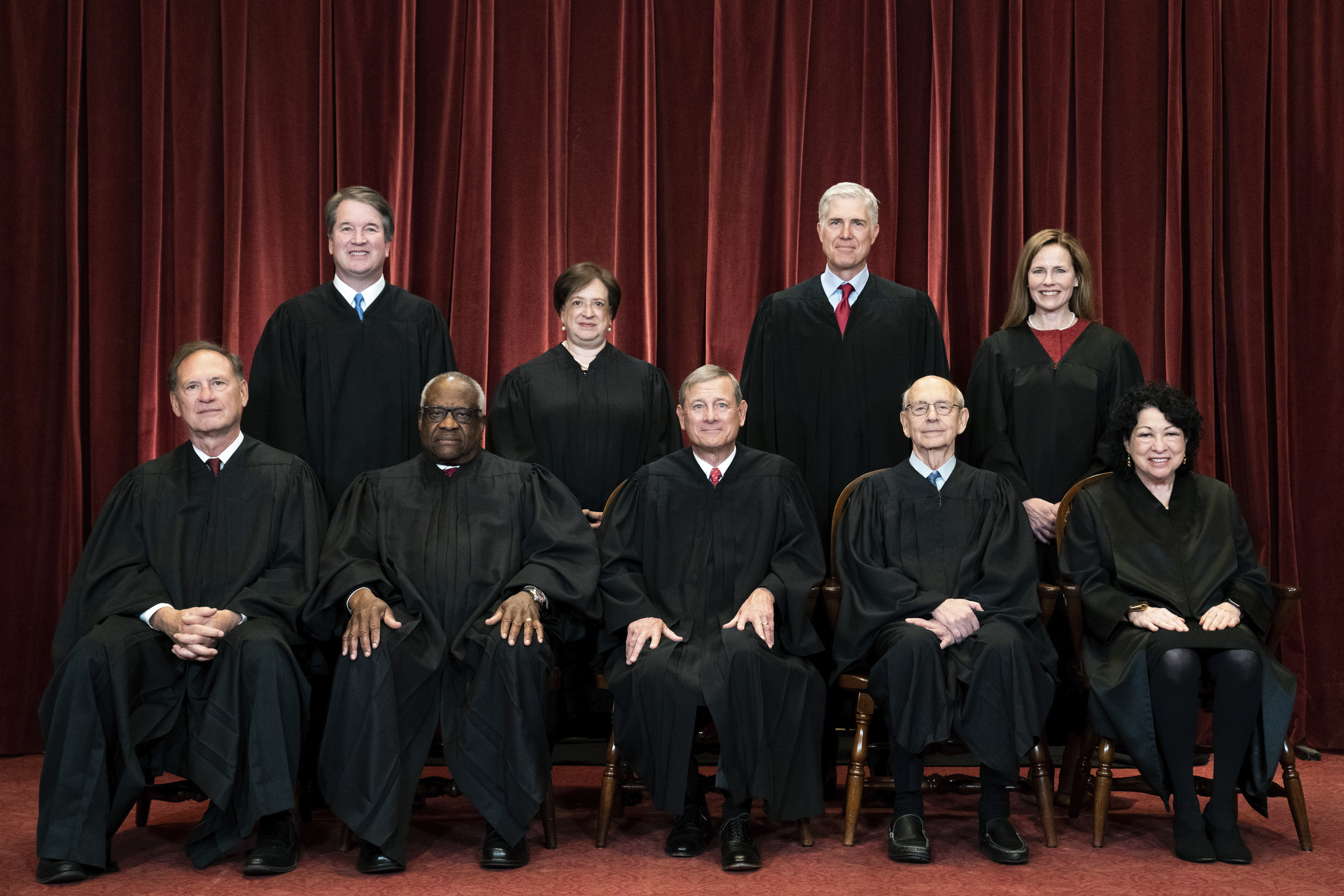 Members of the Supreme Court pose for a group photo at the Supreme Court in Washington, DC, Friday, April 23, 2021. Seated from left are Associate Justice Samuel Alito, Associate Justice Clarence Thomas, Chief Justice John Roberts, Associate Justice Stephen Breyer and Associate Justice Sonia Sotomayor, standing from left are Associate Justice Brett Kavanaugh, Associate Justice Elena Kagan, Associate Justice Neil Gorsuch and Associate Justice Amy Coney Barrett [Erin Schaff/The New York Times via AP, Pool]