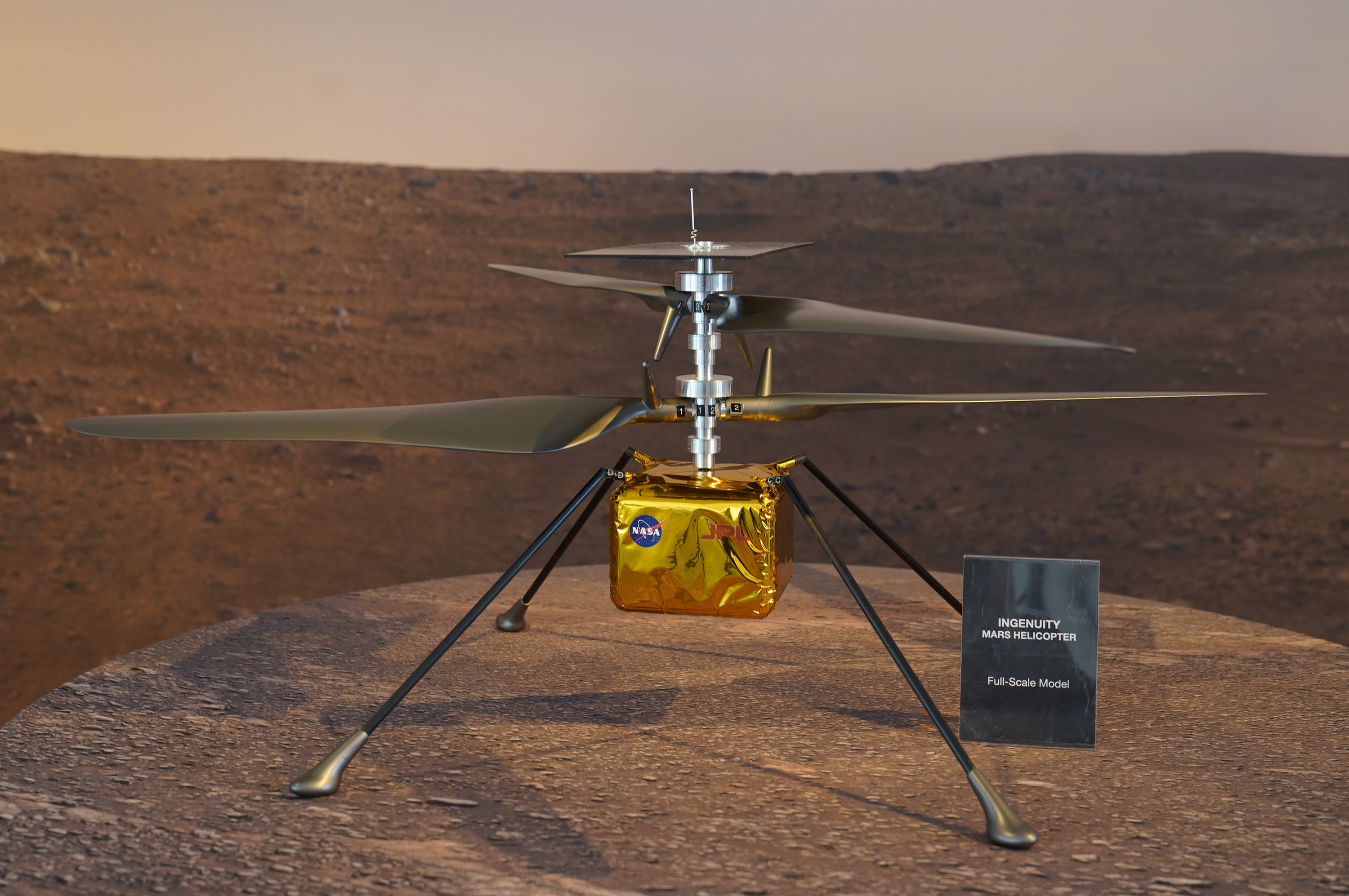 The tiny Ingenuity chopper hitched a ride to Mars attached to the belly of NASA's Perseverance rover, and ever since landing on the Red Planet on February 18, has exceeded scientists' expectations [File: Damian Dovarganes/AP Photo]
