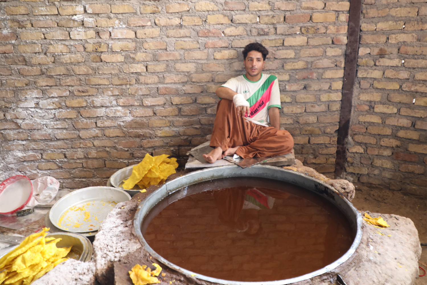 Herat is known for its treats, but with fewer orders, sweet makers fear they may not be able to turn a profit this year [Mohammad Aref Karimi/Al Jazeera]