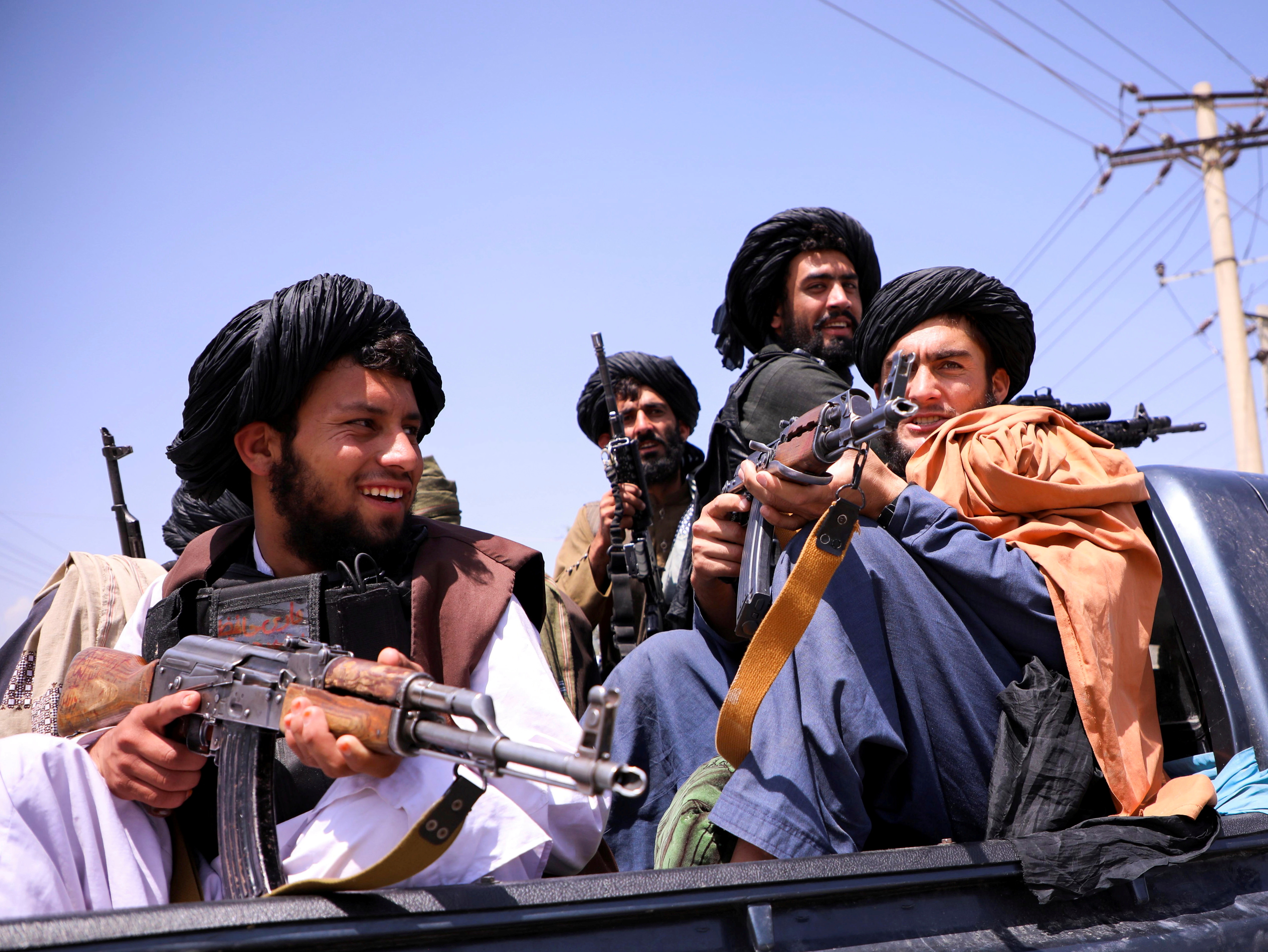 Families of former officials have told Al Jazeera that Taliban fighters have tried to seize their belongings, including homes they rented and their private cars [File Photo: Reuters]