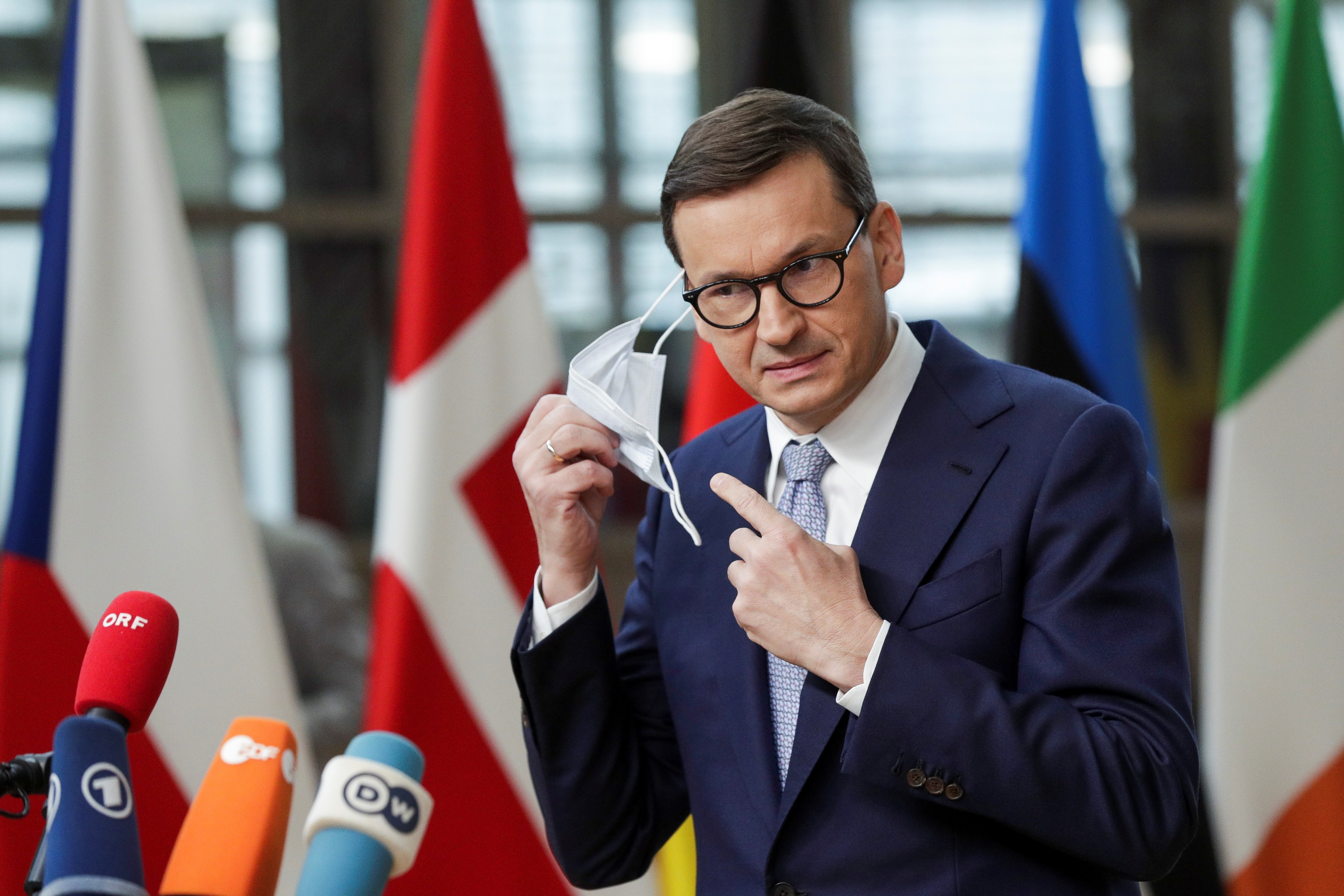 Poland's Prime Minister Mateusz Morawiecki at a press conference
