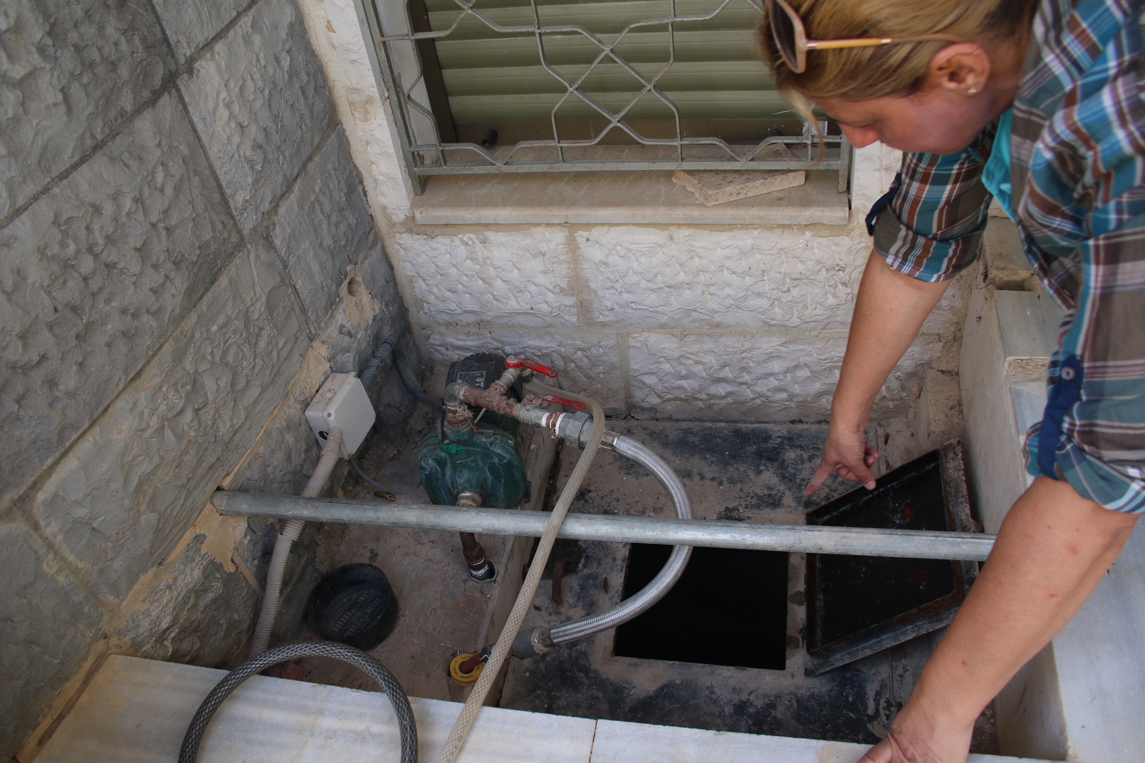 Some Jordanians, such as Majidah Naser, build wells to help supply their additional water needs [Melissa Pawson/Al Jazeera]
