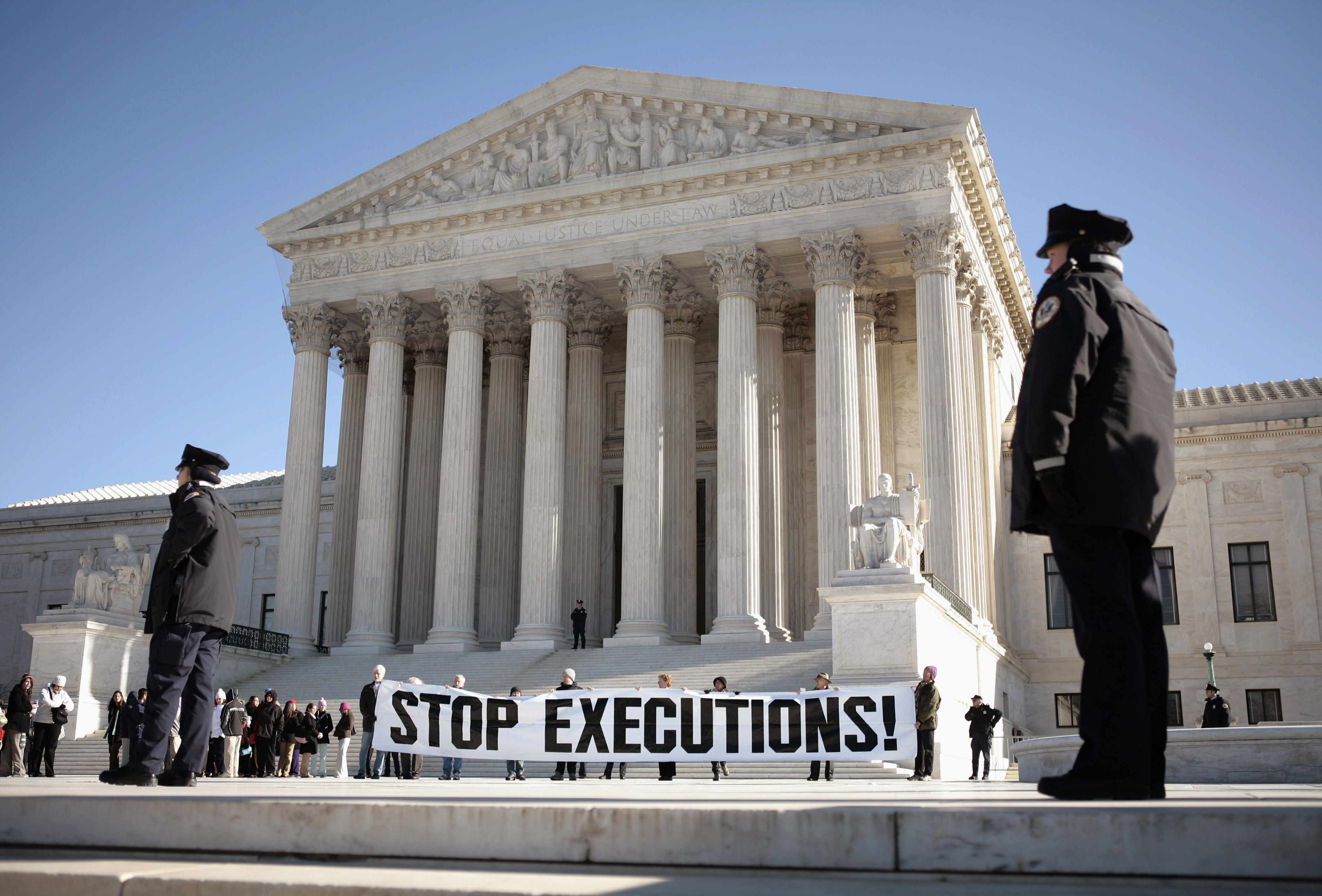 Protesters calling for an end to the death penalty unfurl a banner outside the U.S. Supreme Court in Washington in January 2007.