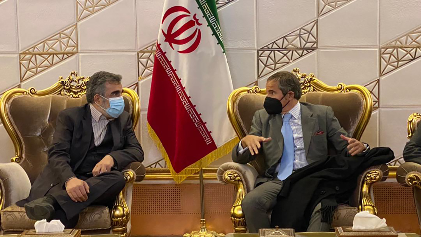 Director General of International Atomic Energy Agency, IAEA, Rafael Mariano Grossi, right, speaks with deputy head of the Atomic Energy Organization of Iran Behrouz Kamalvandi