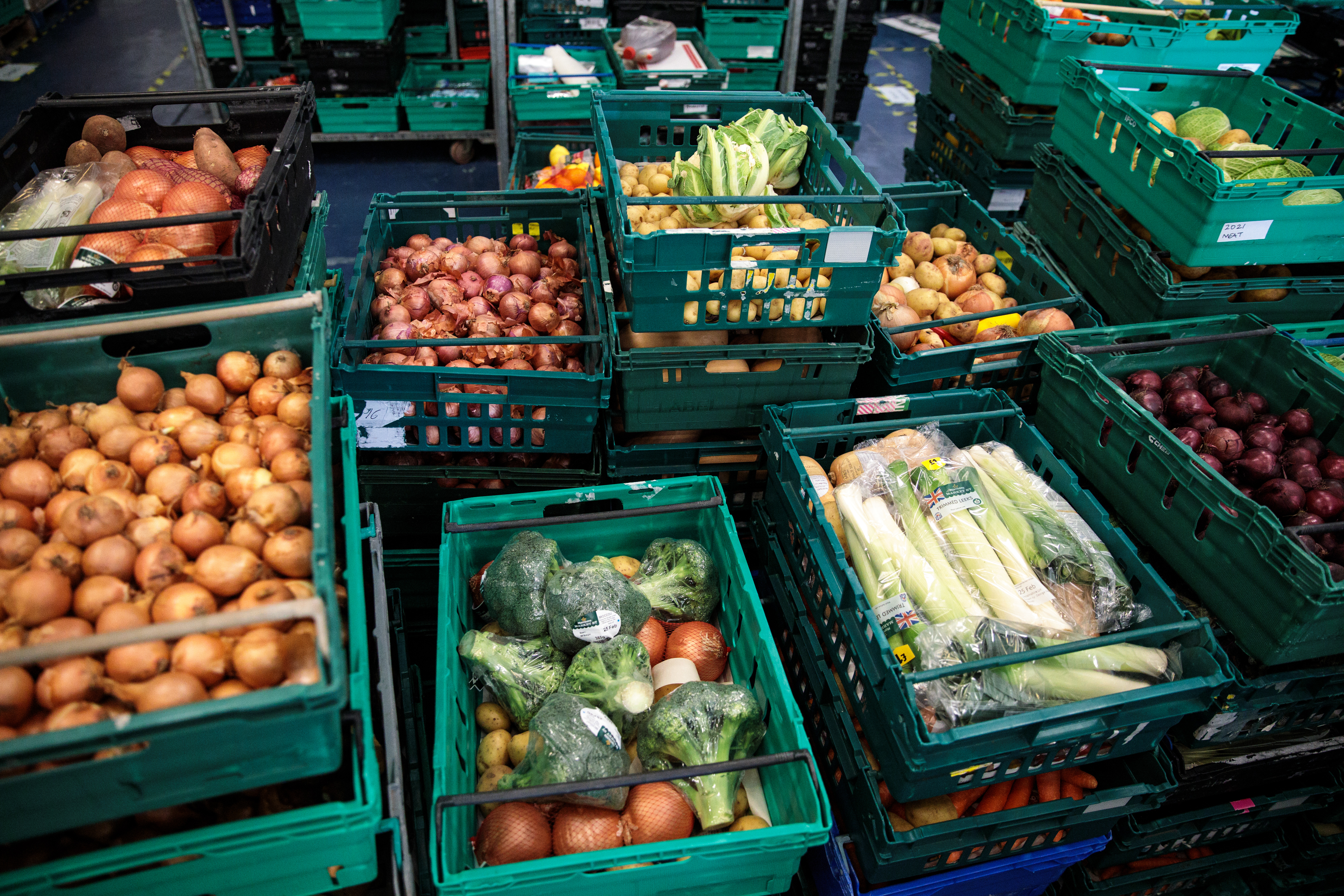 Crates of surplus food collected from supermarkets sit stacked at a food-waste charity's warehouse on February 27, 2019 in London, England [Jack Taylor/Getty Images]