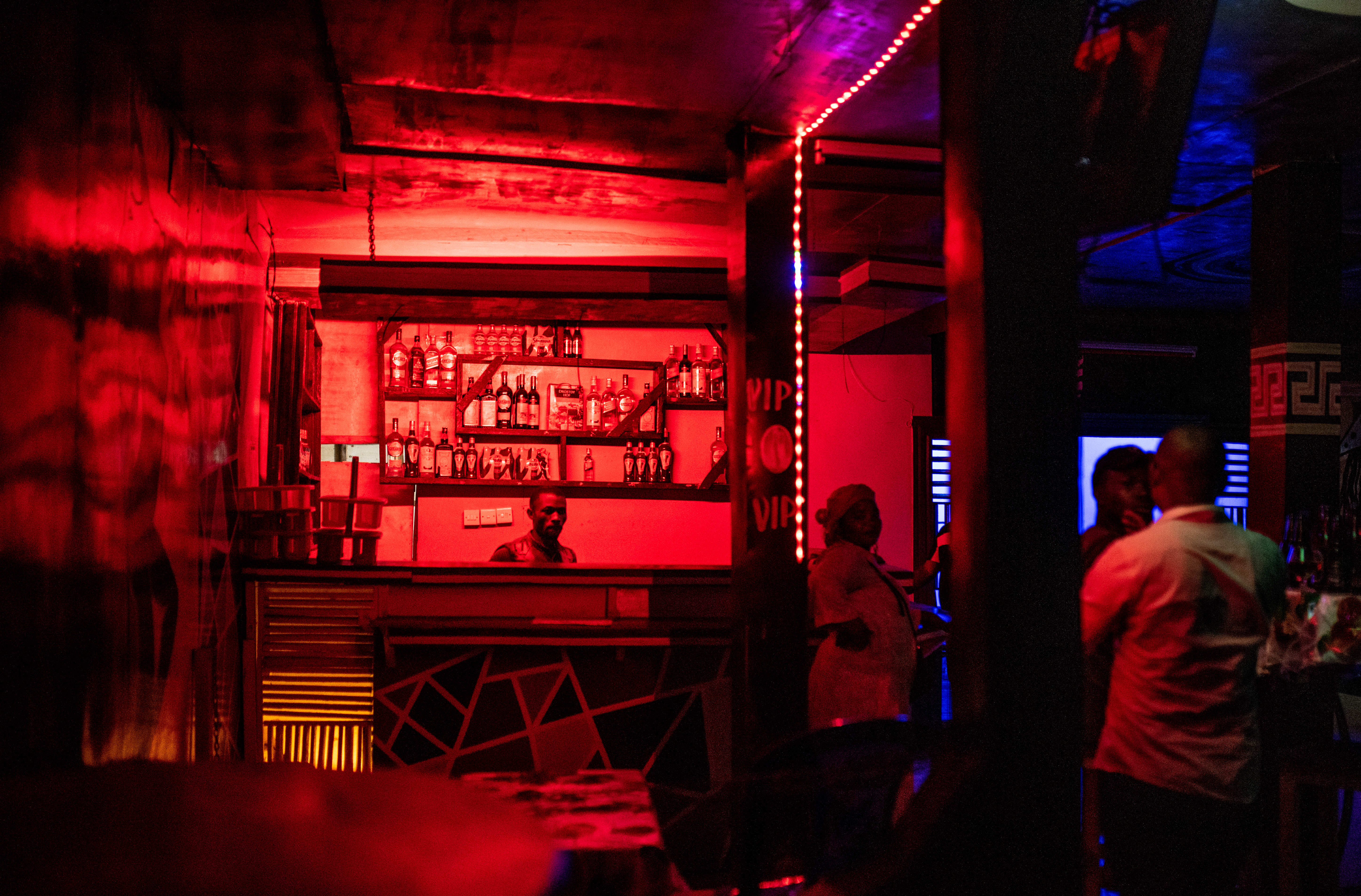 A makeshift nightclub in Luhihi where miners spend time after they have finished work for the day [Olivia Acland/Al Jazeera]