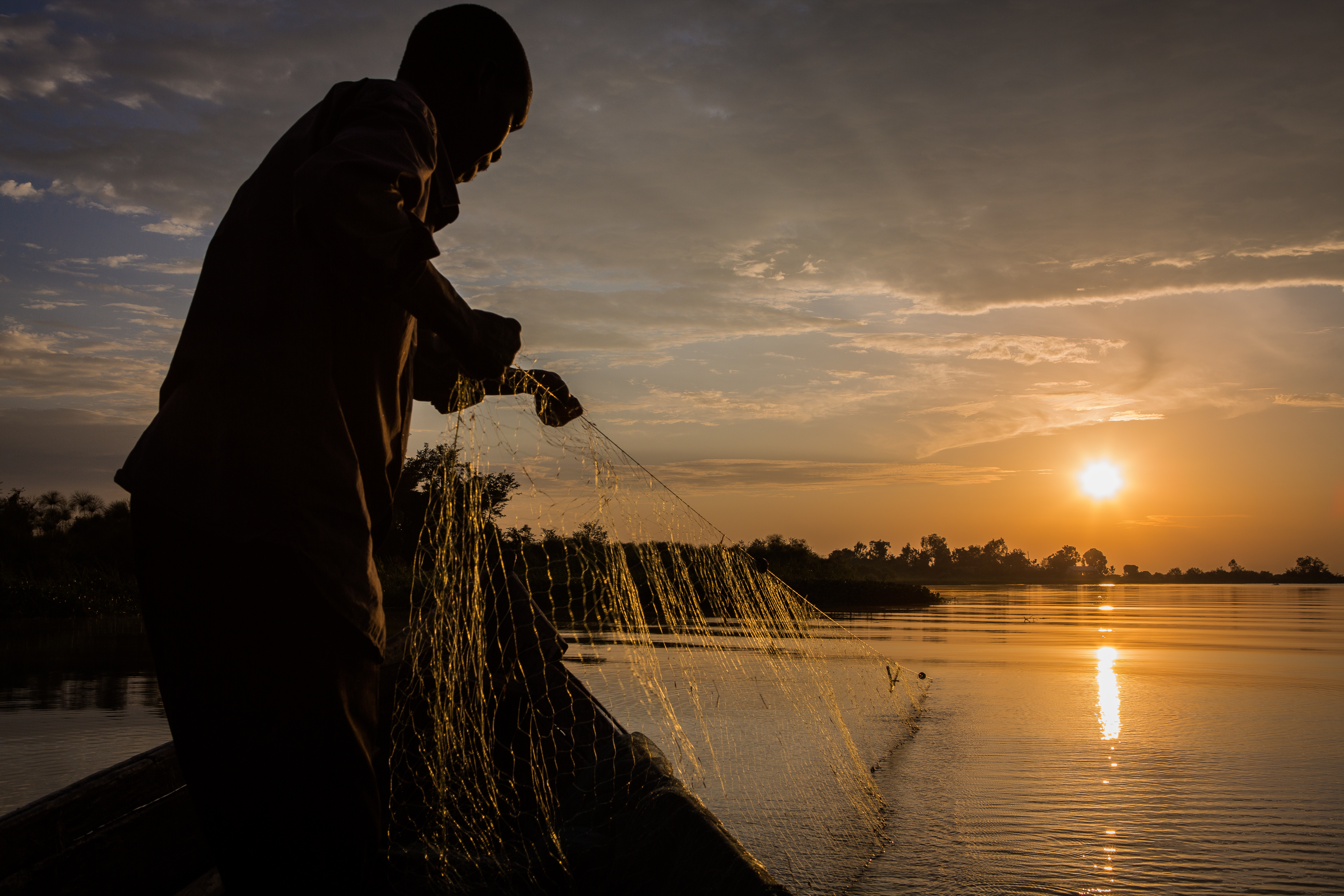 Kenyan fisherman Enos Awele Ajuoga takes his nets out of Lake Victoria’s water every morning. “Most youth, even those unemployed, are not interested in working in the fishing industry, socially it is not looked high at. A graduate working on the lake is perceived as a nobody.” said Ali Juma, a secretary at KENAFA. [Sebastian Castelier/Al Jazeera]