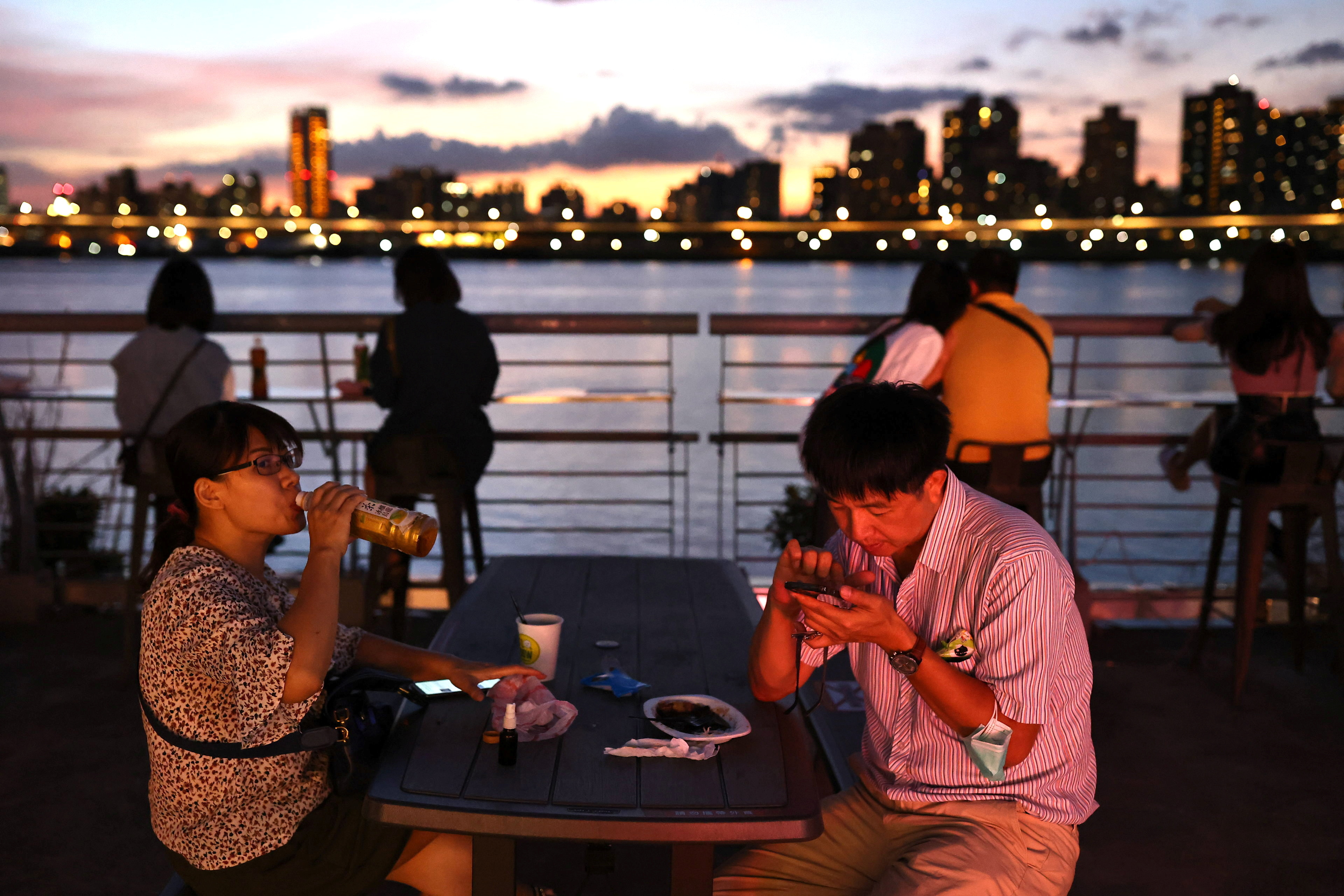After decades of living with the threat of a possible invasion by China, Taiwanese have learned to cope by living in the moment [File: Ann Wang/Reuters]
