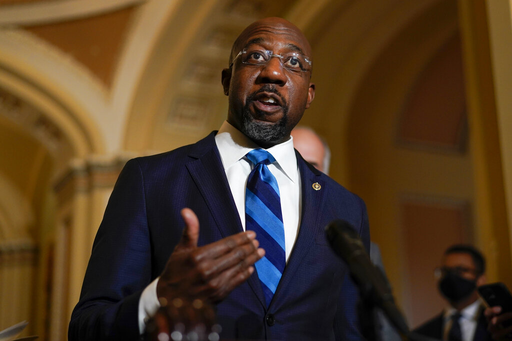 Georgia Democrat Senator Raphael Warnock speaks during a news conference after the weekly Democratic policy luncheon on Capitol Hill.