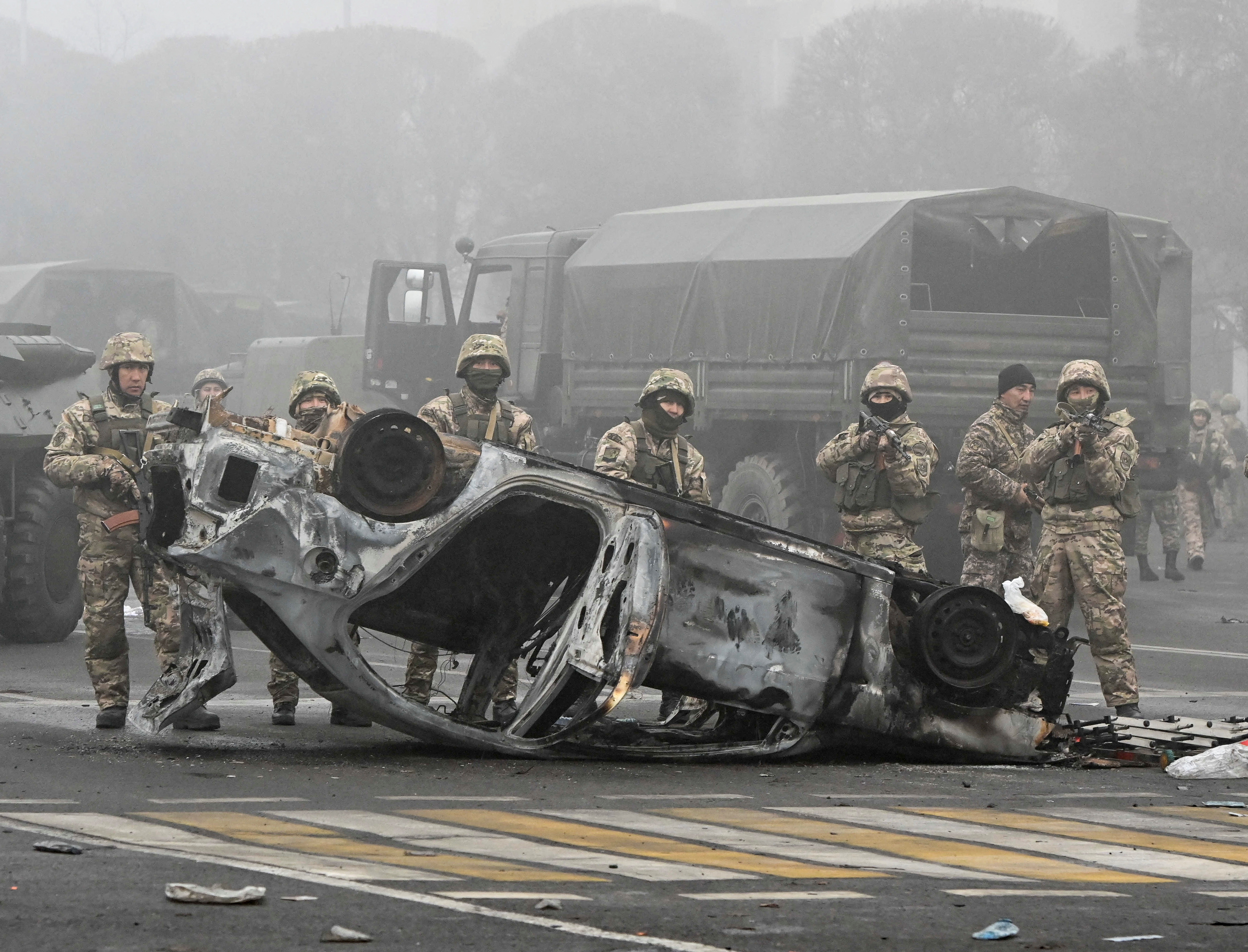 Troops are seen at the main square where hundreds of people were protesting against the government, after authorities' decision to lift price caps on liquefied petroleum gas, in Almaty, Kazakhstan January 6, 2022.