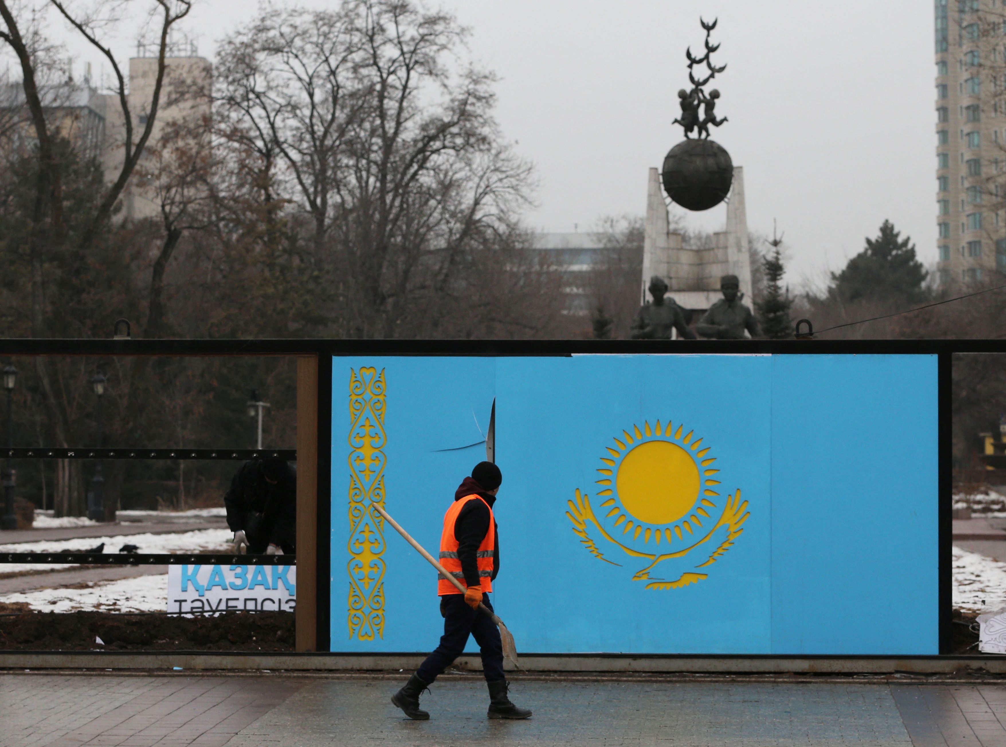 A municipal worker cleans the streets in Almaty, Kazakhstan
