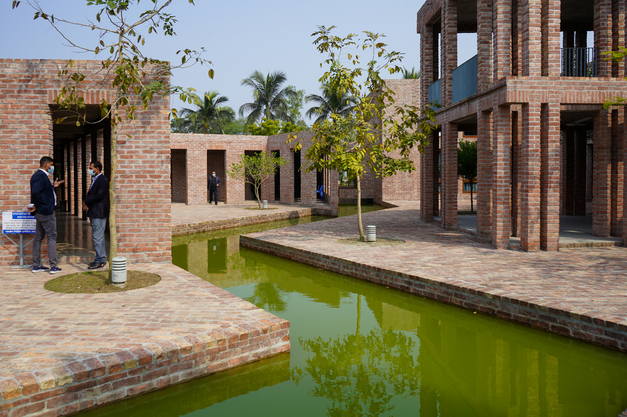 Rain Harvesting Canal crisis crossing insides the friendship hospital. The canals are designed for microclimatic cooling and work as a divider, in terms of zoning of the hospital