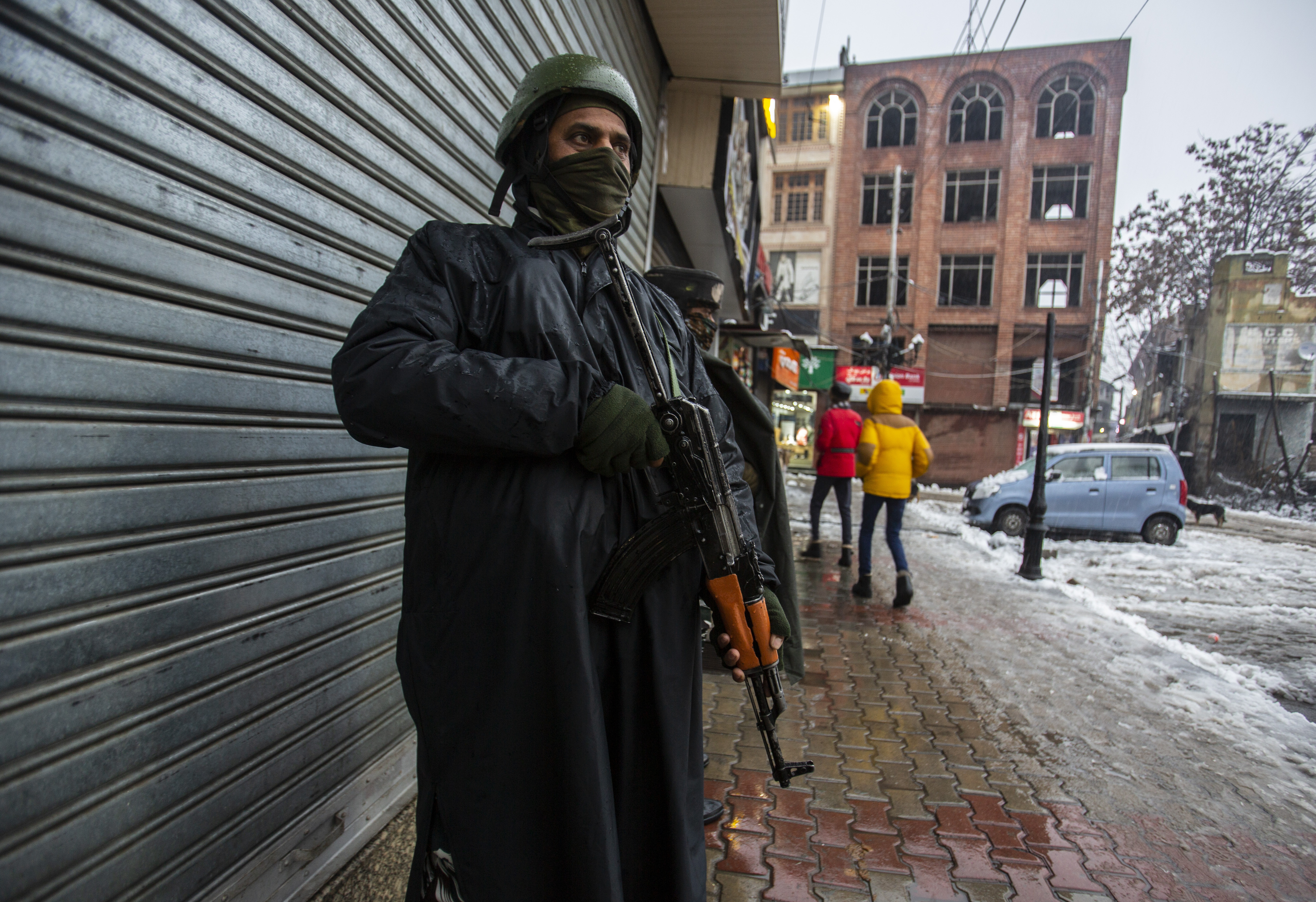 Indian paramilitary soldiers stand guard in Srinagar, Indian controlled Kashmir
