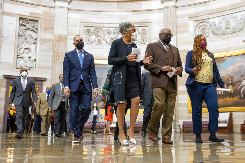 Rep. Hakeem Jeffries, D-N.Y., Rep. Joyce Beatty, D-Ohio, and House Majority Whip Jim Clyburn, D-S.C., and other members of the Congressional Black Caucus, walk to the Senate chamber to speak to reporters about their support of voting rights legislation.