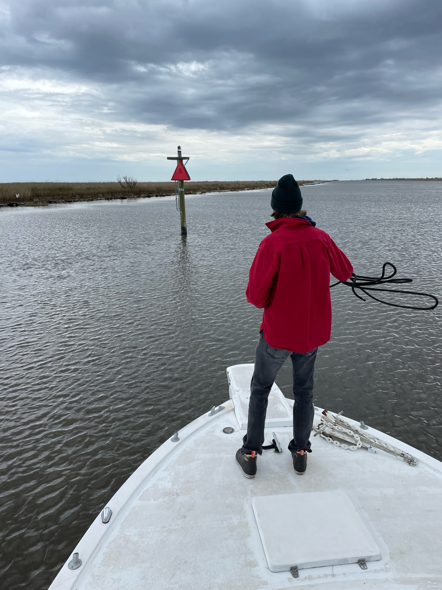 Deckhand Mitchell Jarrett prepares to throw a line.