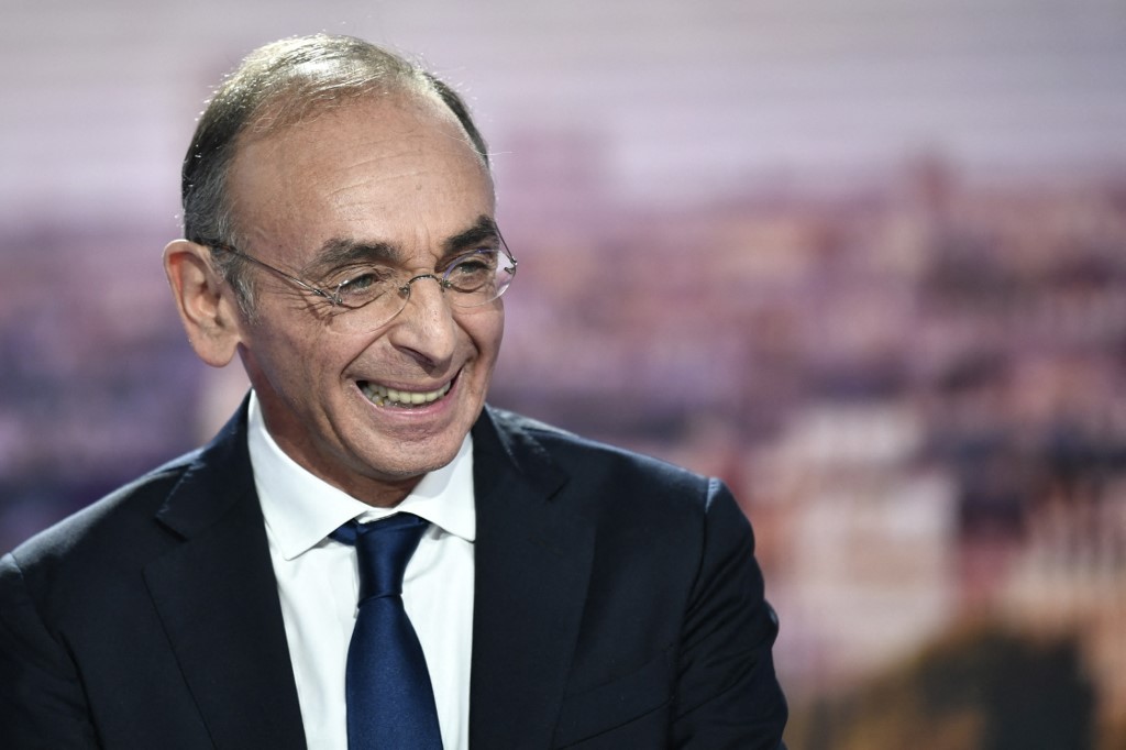 French far-right party Reconquete! presidential candidate Eric Zemmour smiles