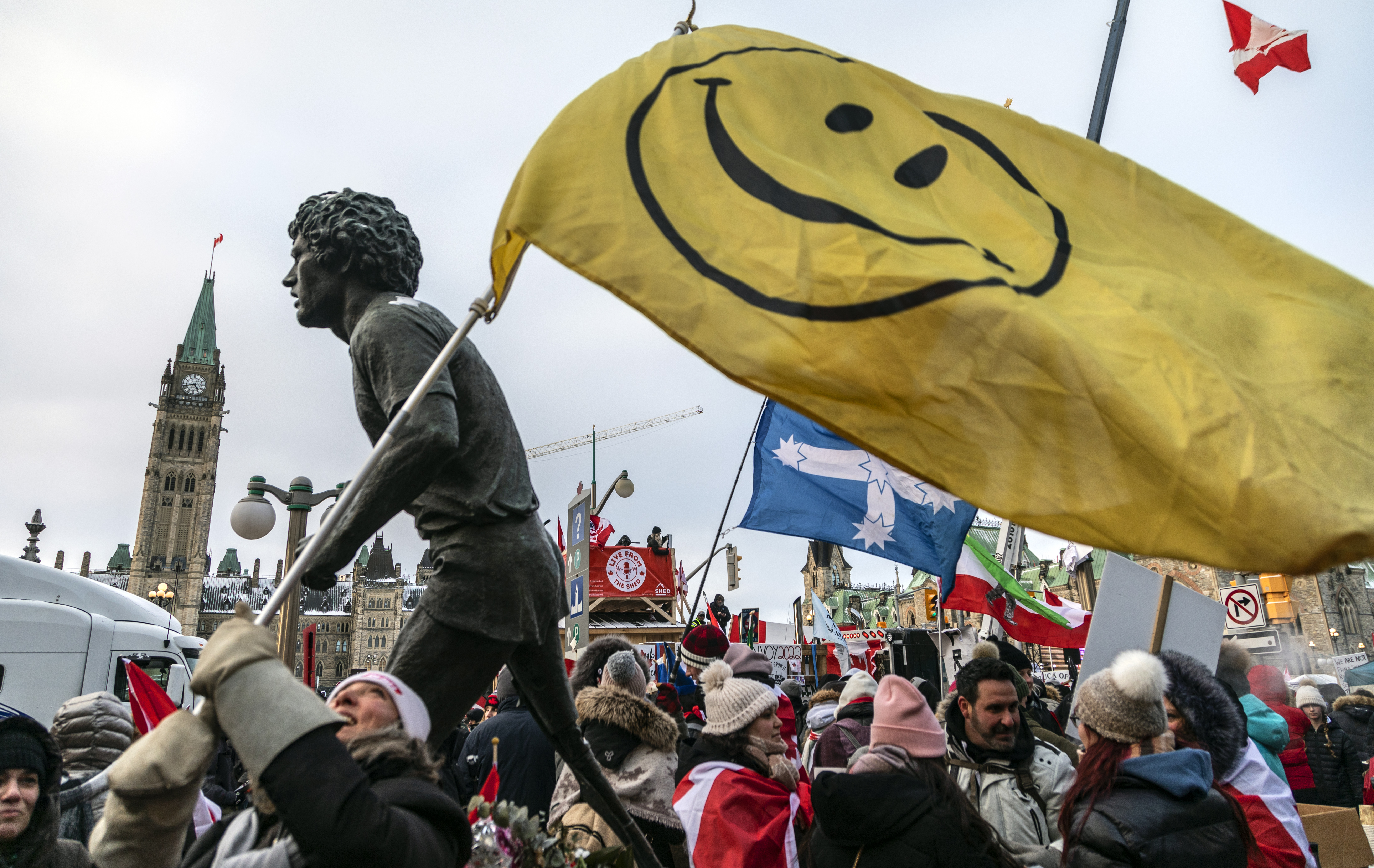 Protesters massed on Wellington street in front of the Canadian Parliament Buildings