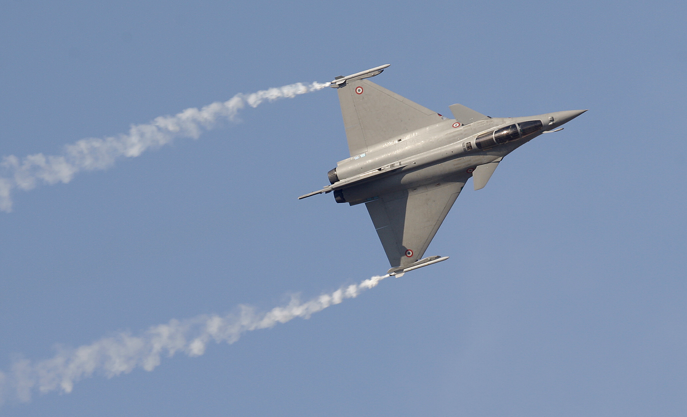 A Rafale fighter jet performs during the first day of the Dubai Airshow November 13, 2011