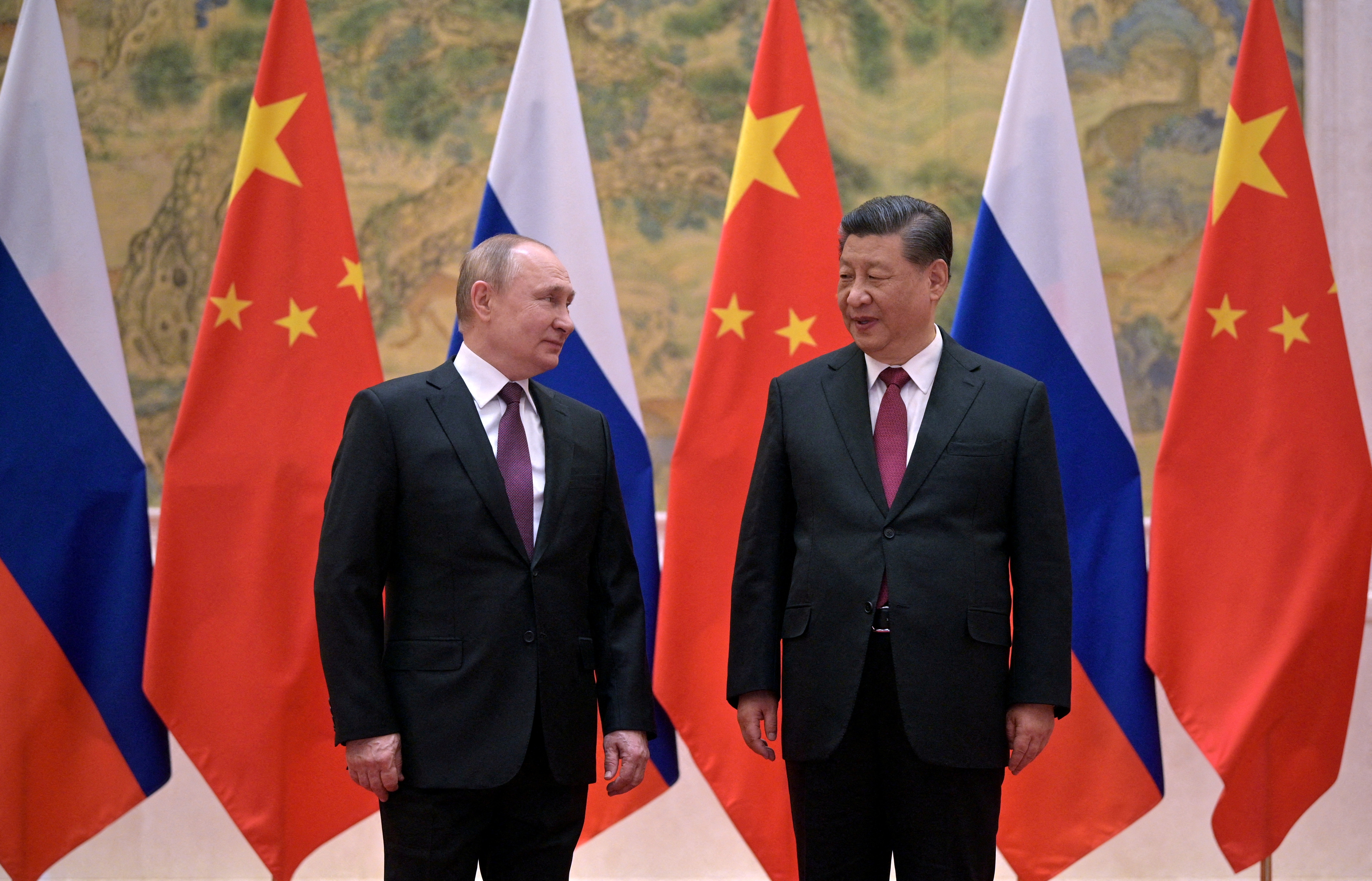 Russian President Vladimir Putin attends a meeting with Chinese President Xi Jinping in Beijing, China, February 24, 2022.