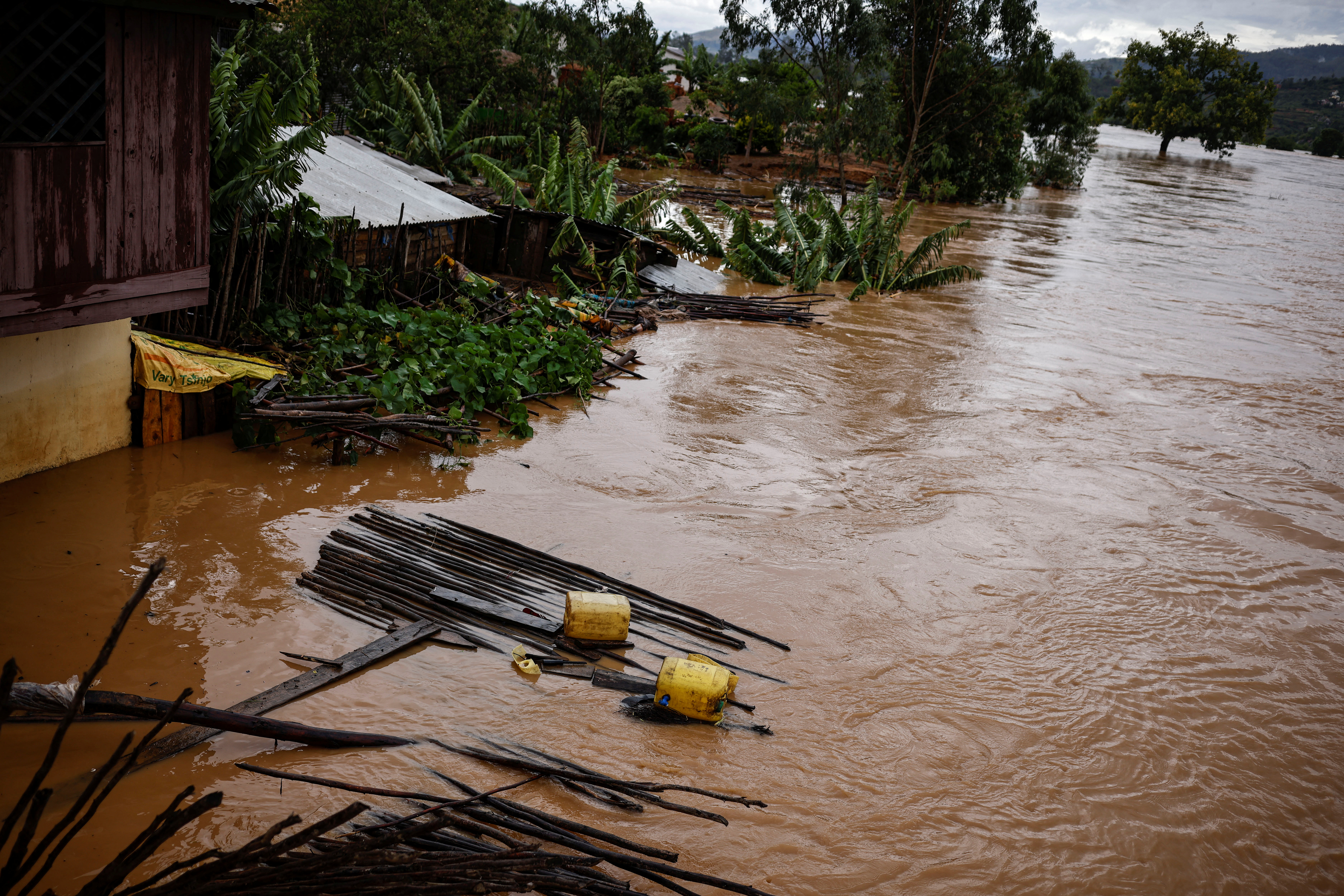 Debris is seen in a flooded area