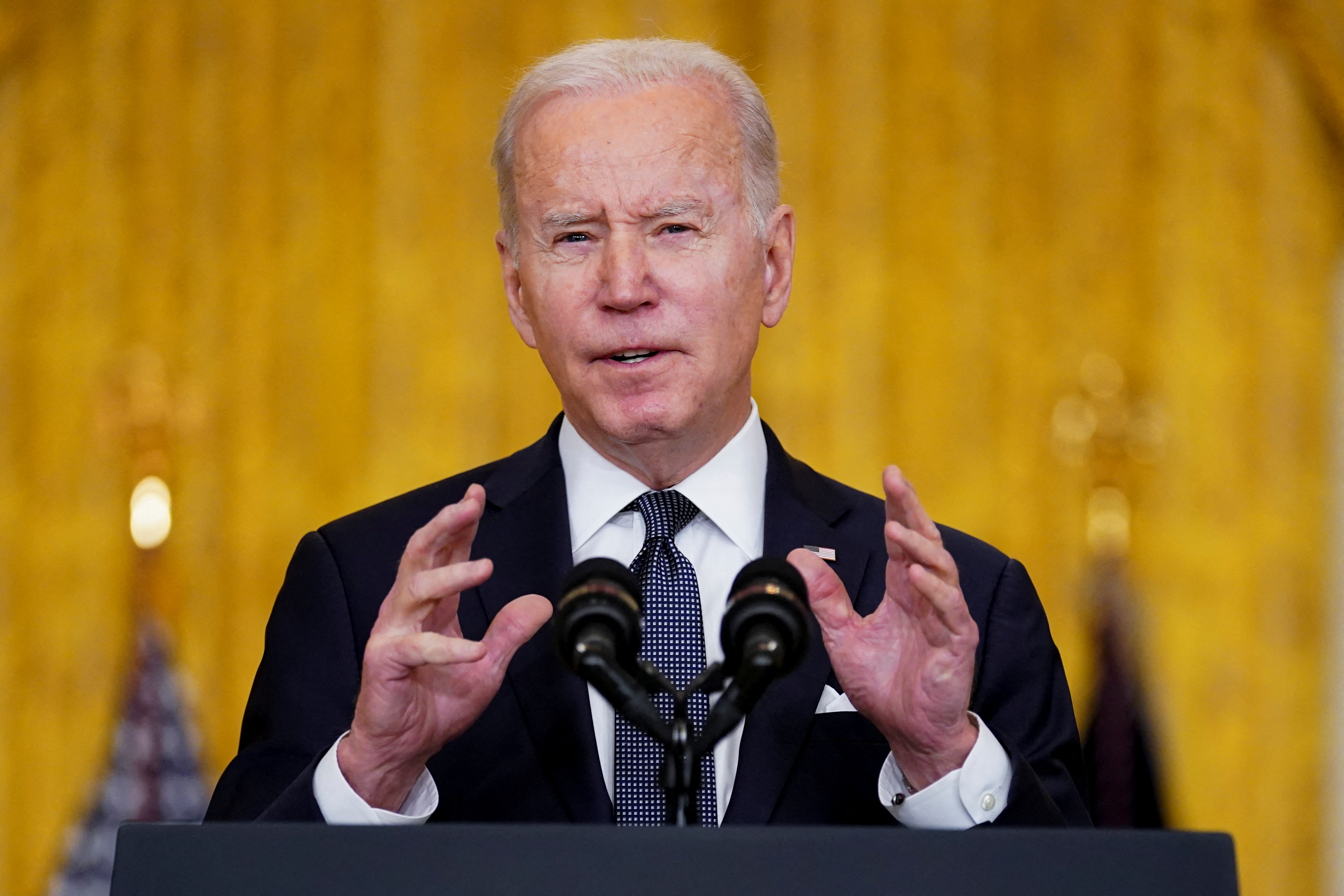 Biden speaks at podium