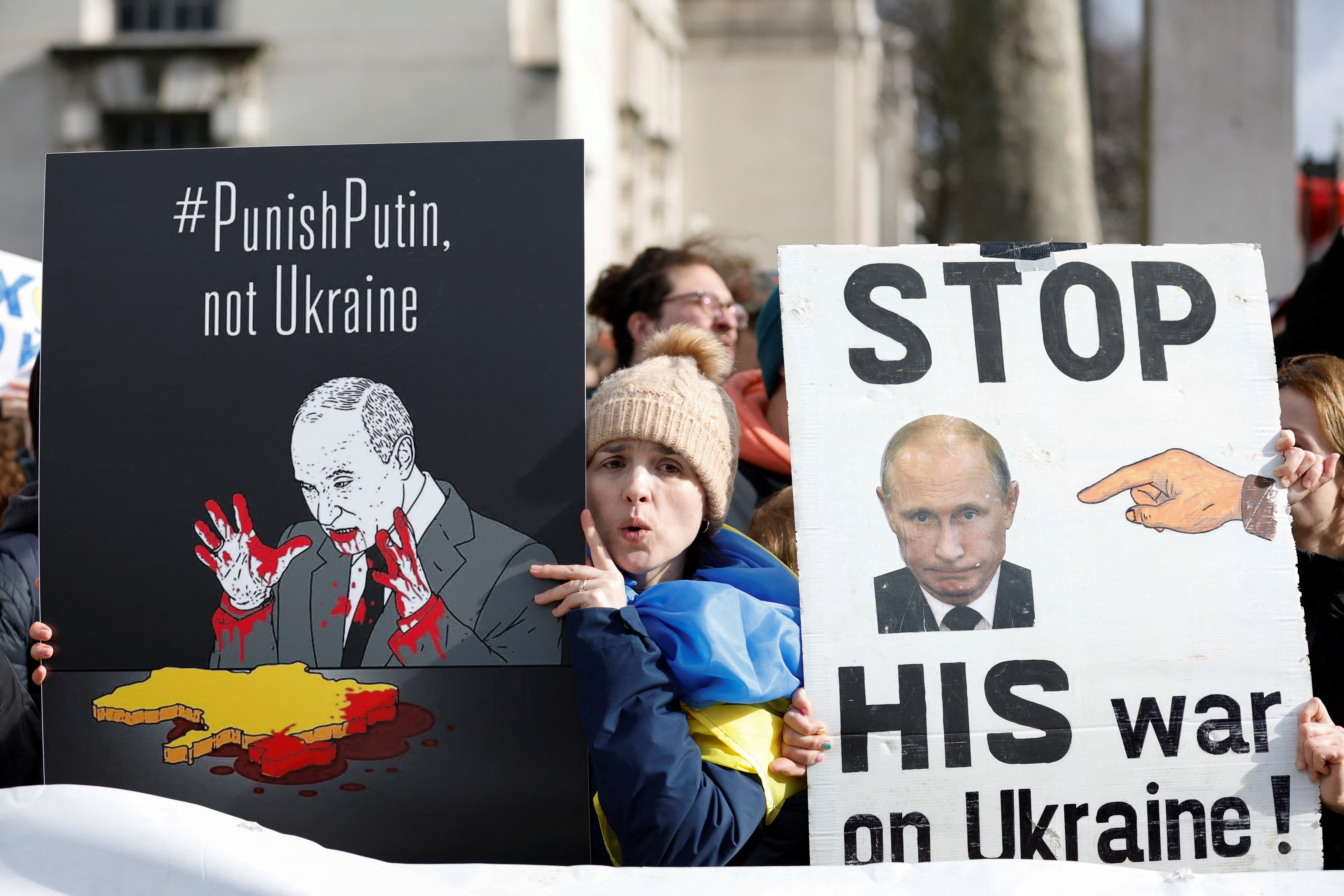 People attend a pro-Ukrainian demonstration on Whitehall, near Downing Street, in London, UK