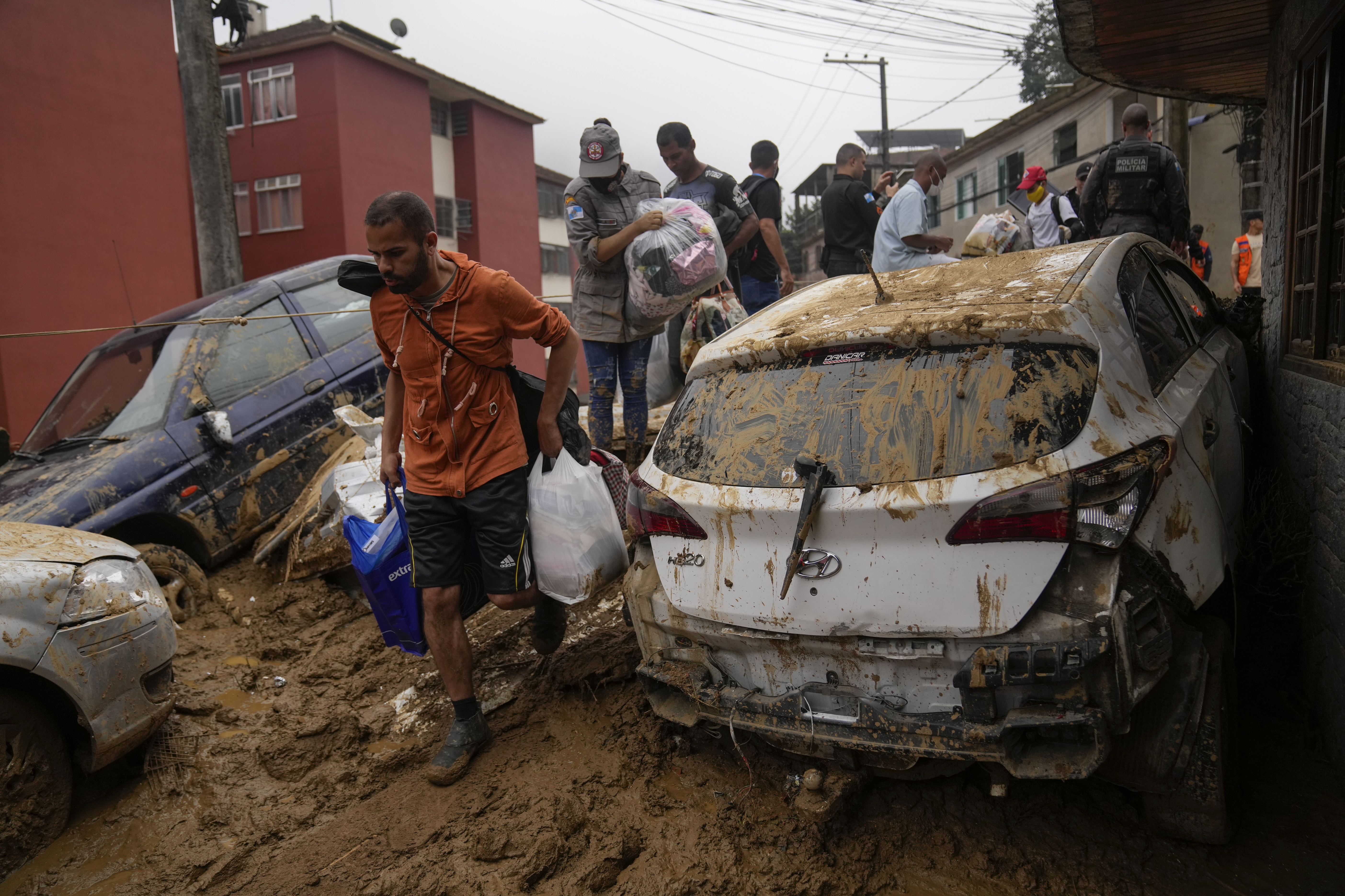Residents recover belongs from thier homes destroyed by mudslides in Petropolis