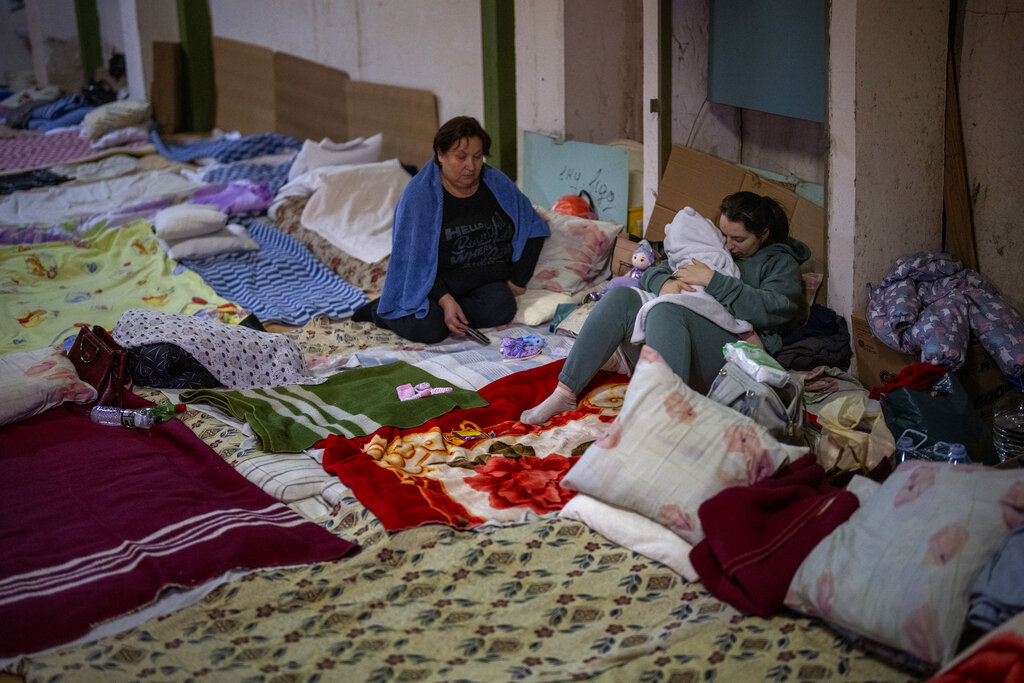 Ukrainian civilians hiding in basement