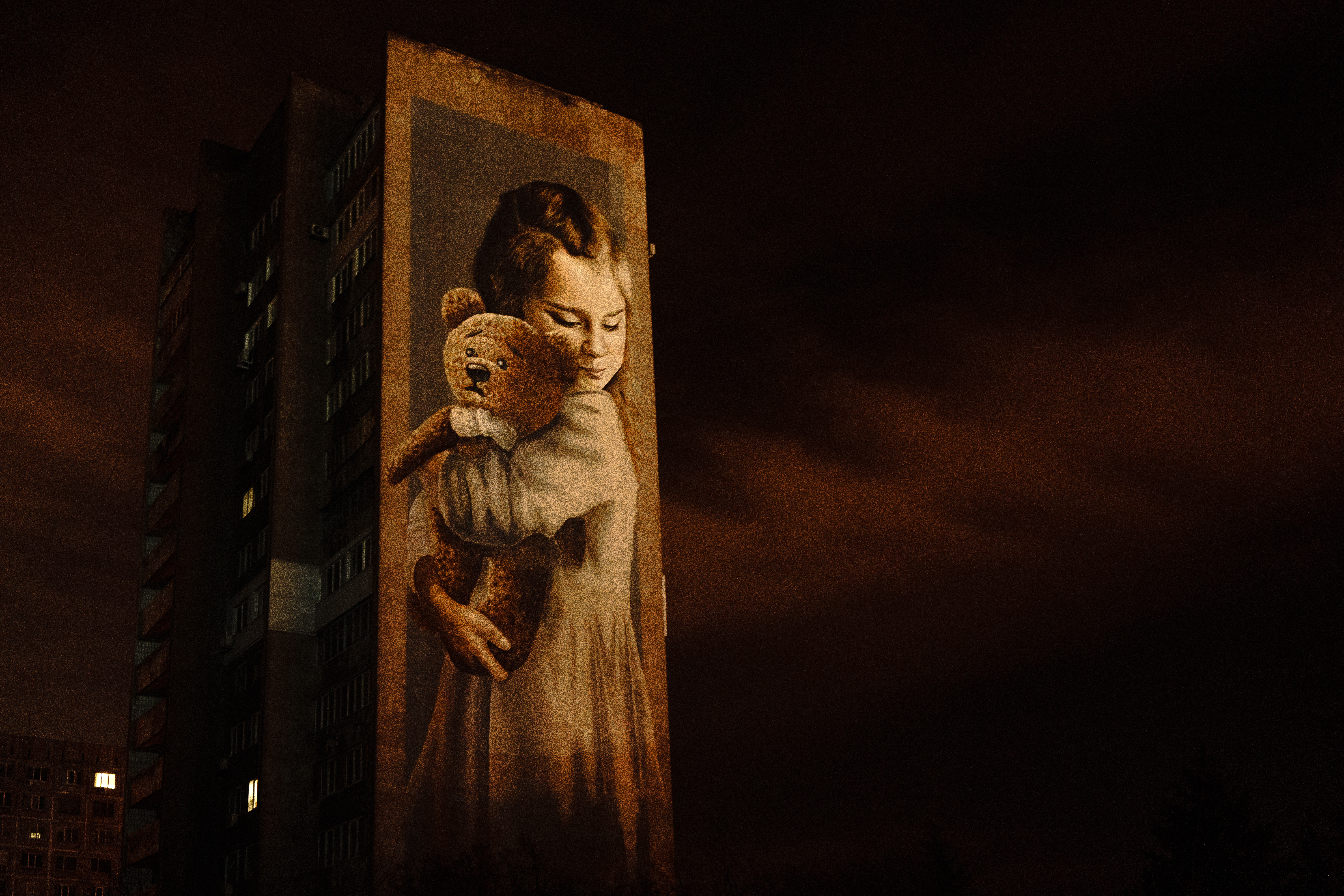 a mural of Milana, who lost her family and leg in the rocket attacks in 2014. Mariupol, Ukraine