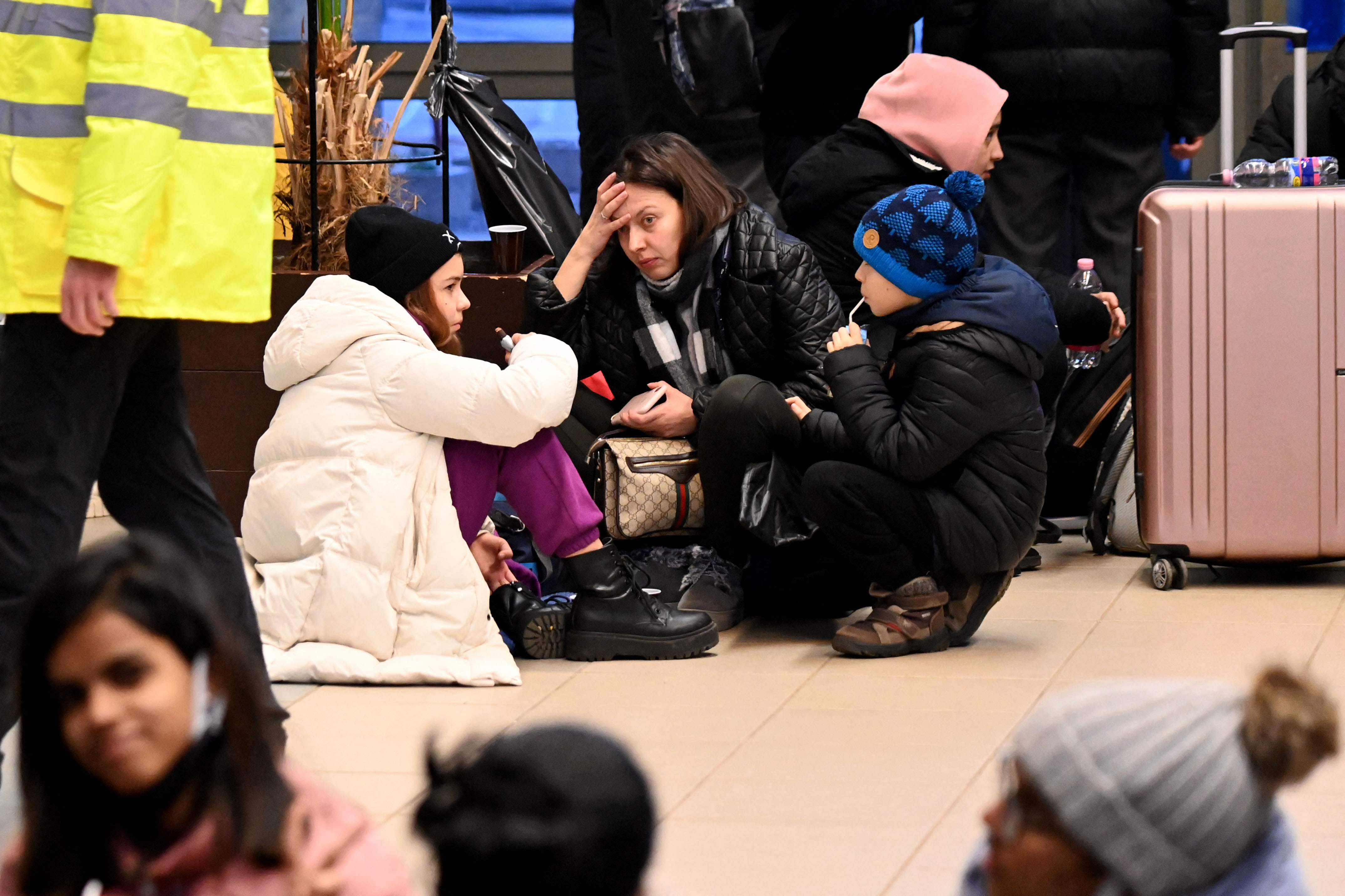 A woman with two children.