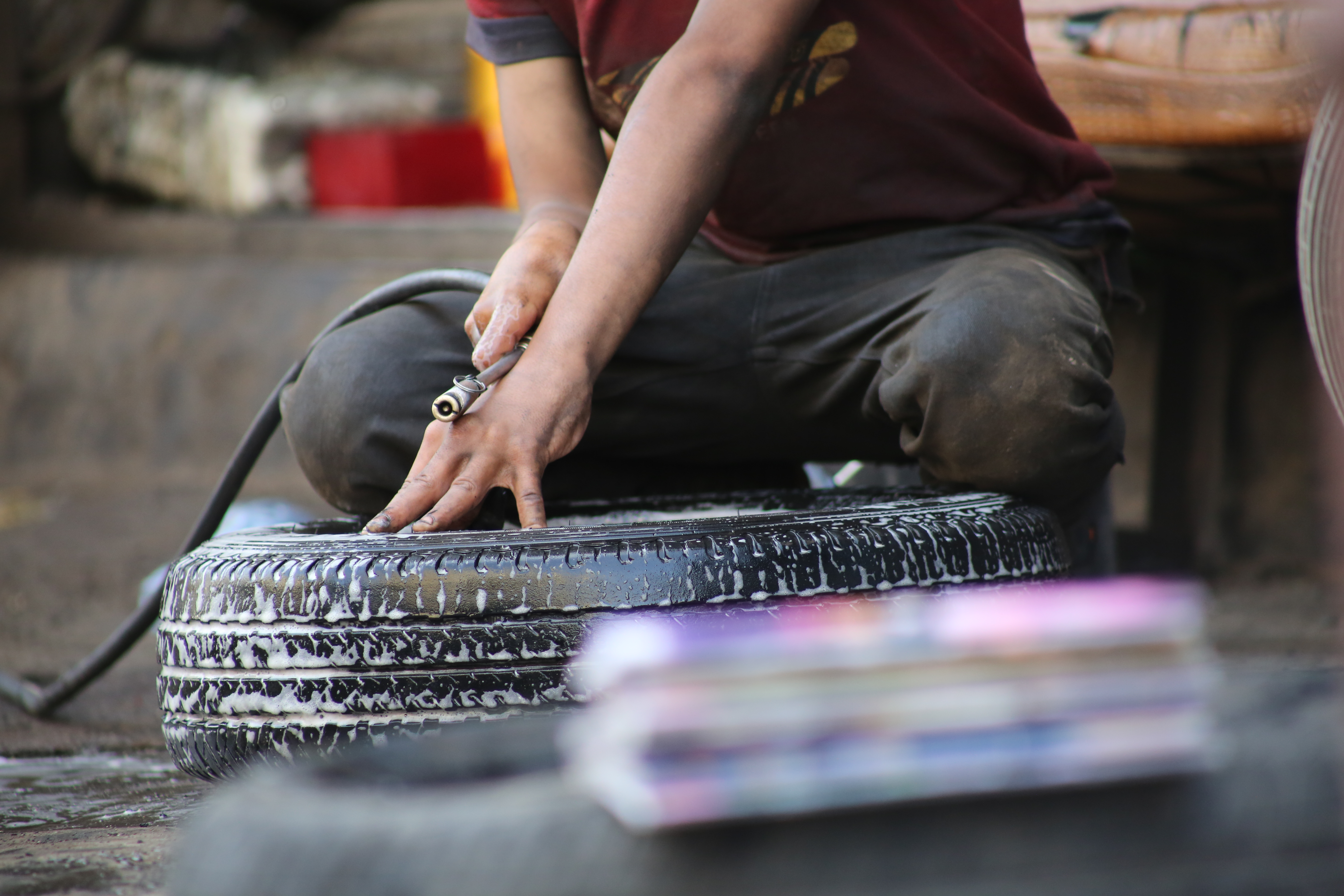 Ahmed (not his real name), a 13 year-old boy, goes to school every morning and works as a mechanic in the afternoon and during weekends with his father