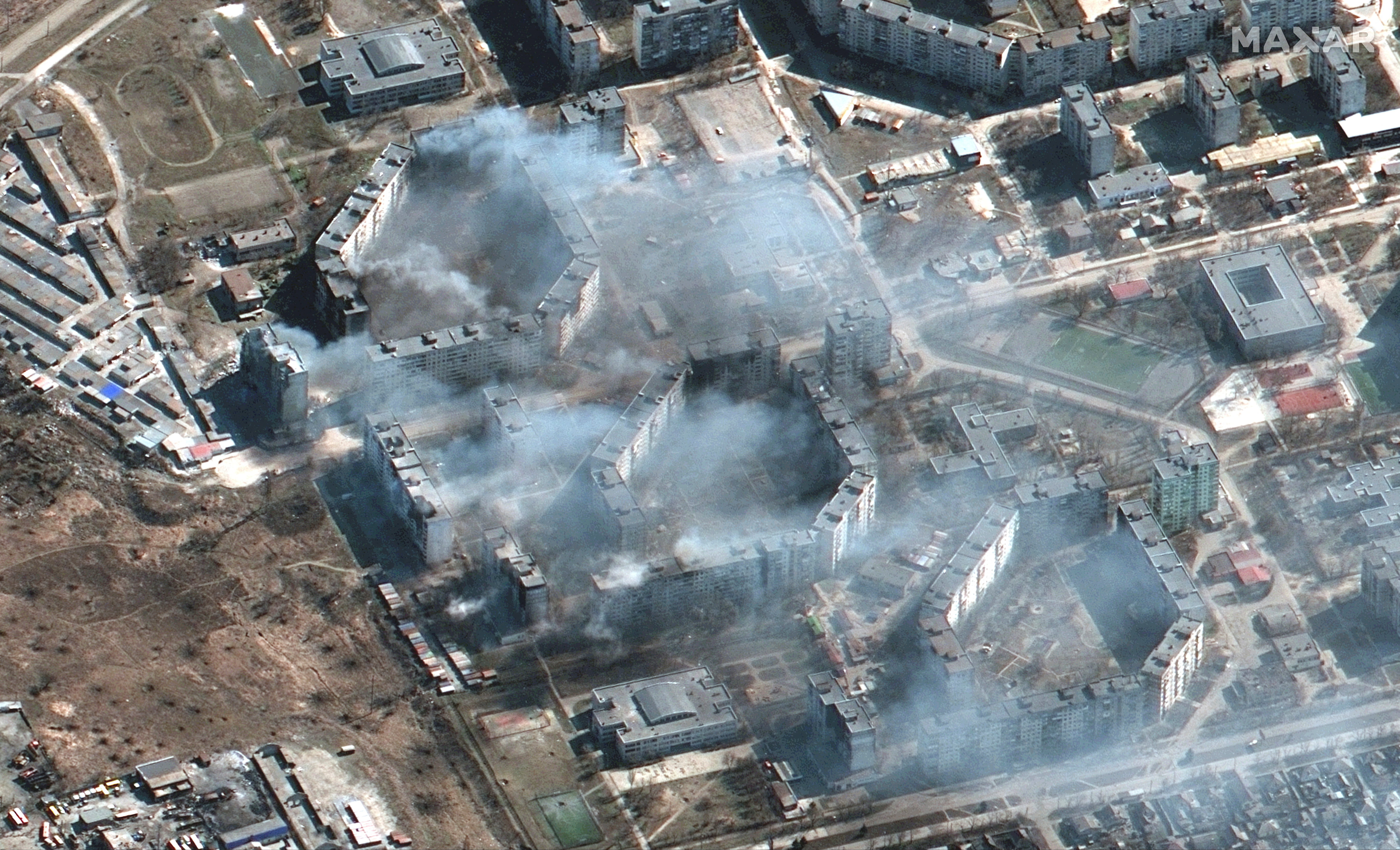 A satellite image shows burning apartment buildings in Mariupol, Ukraine, March 19, 2022.