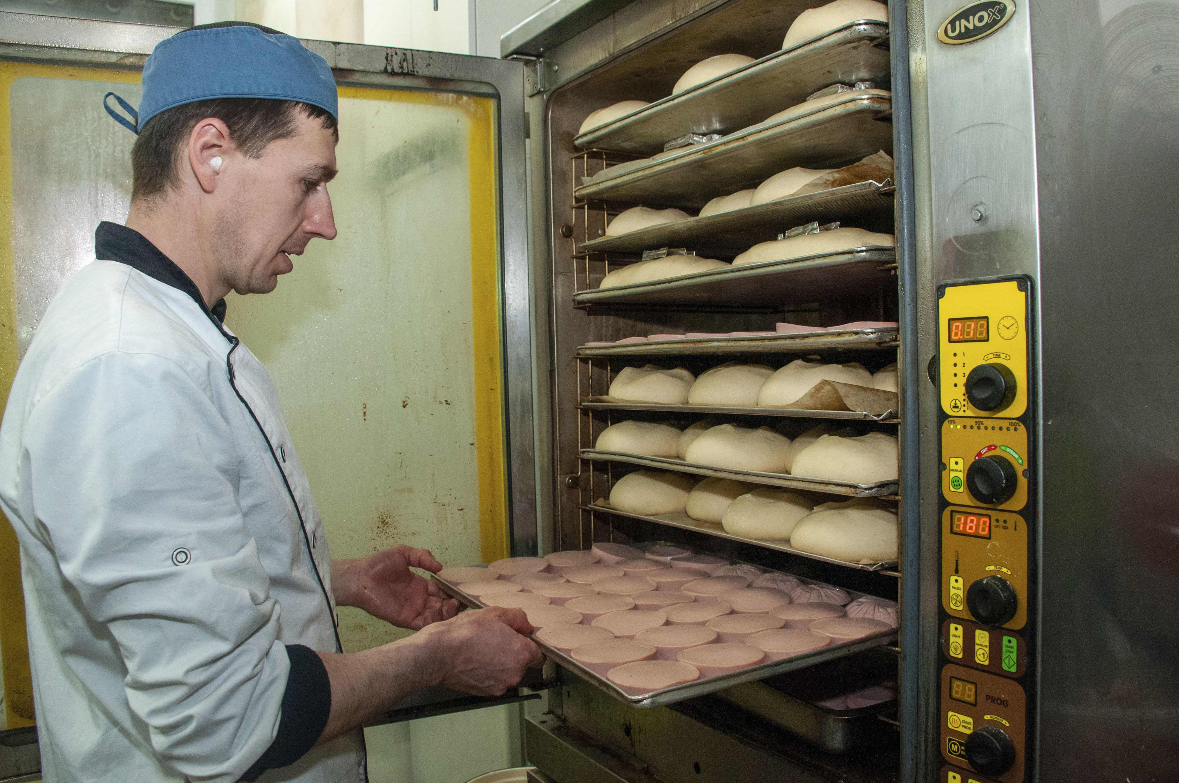 A volunteer bakes bread for Ukrainian servicemen in Kharkiv