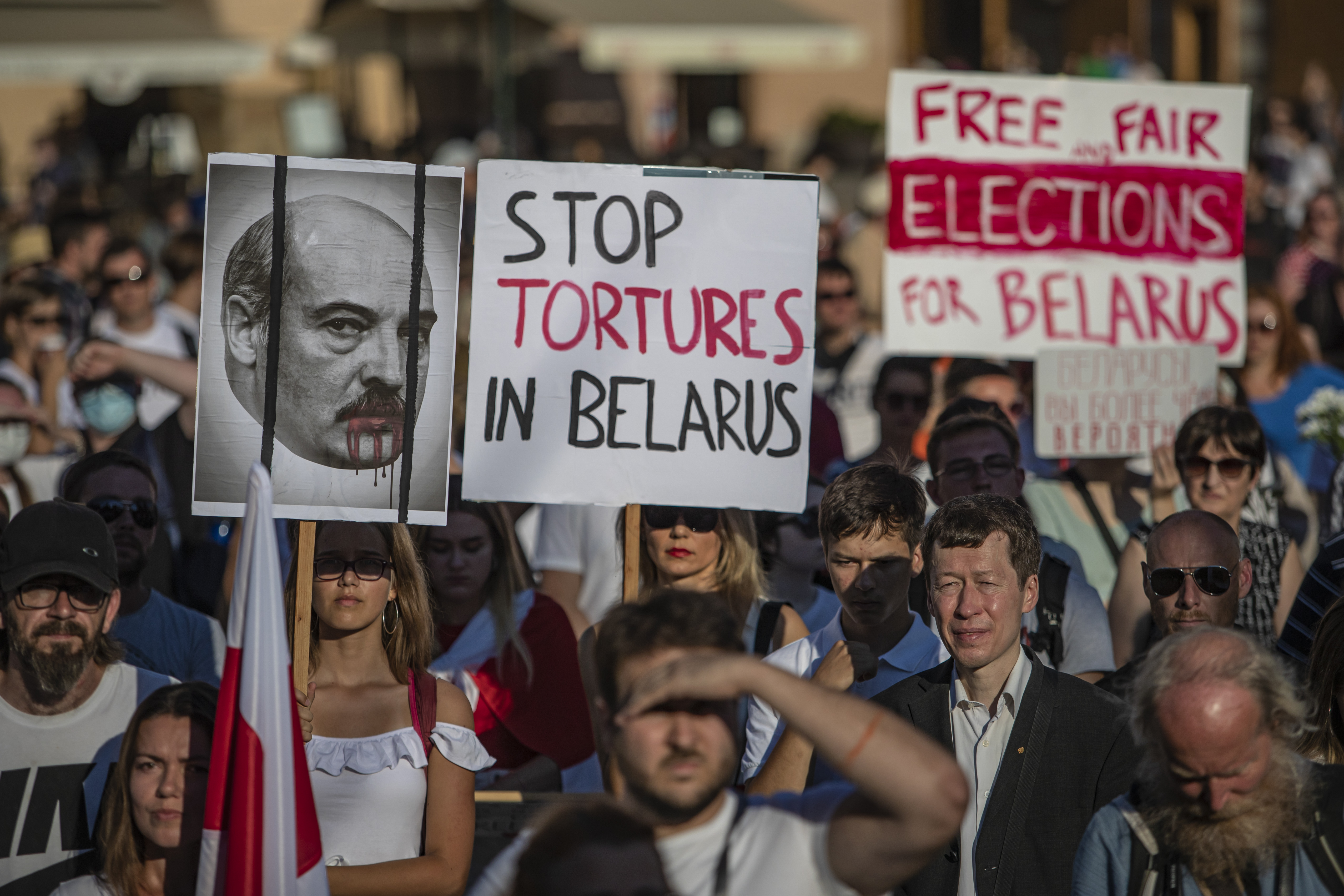 People protest against the election results and the ongoing violence after the Belarusian presidential elections, at Old Town Square in Prague