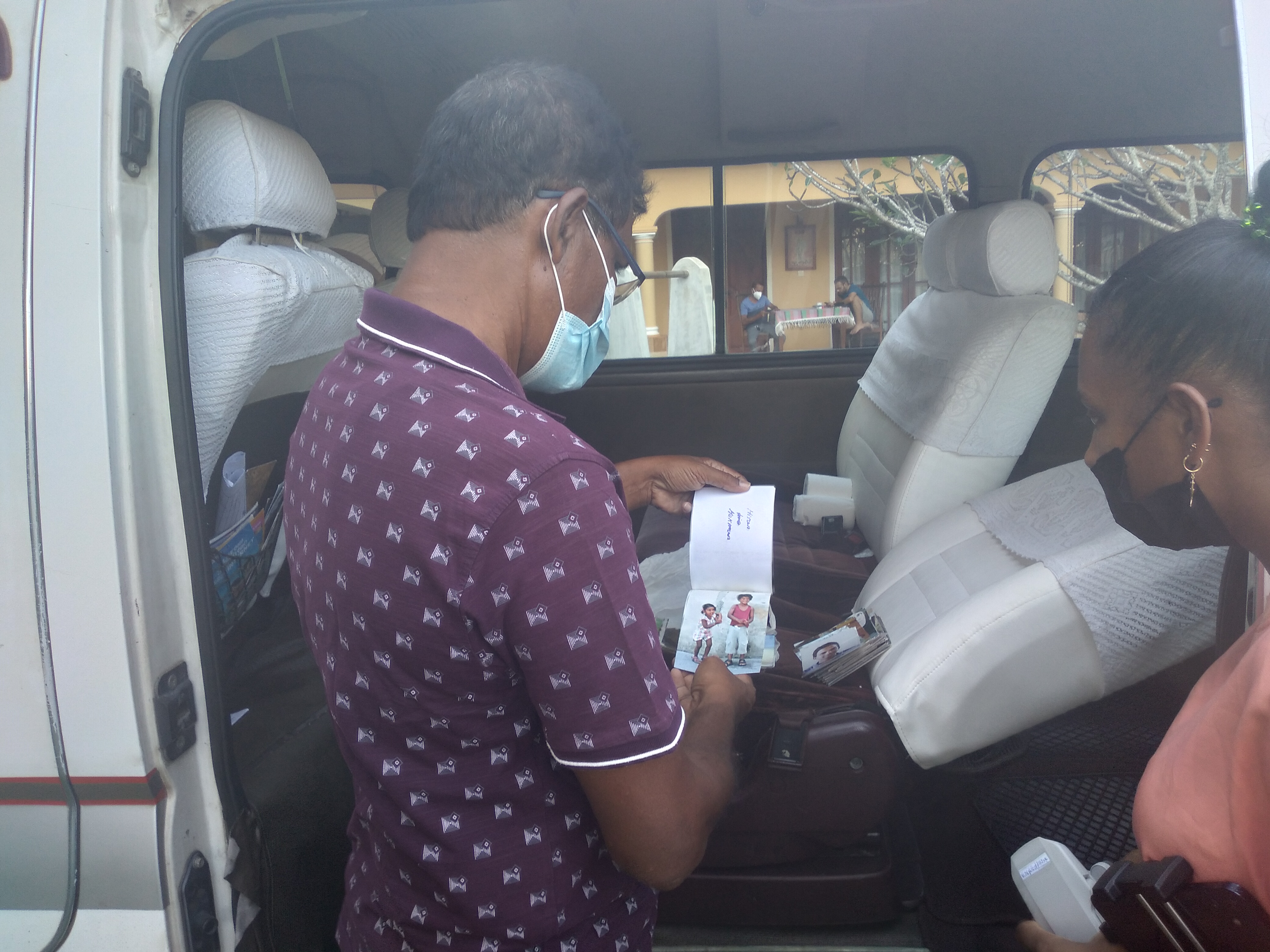 A man looks as a photo