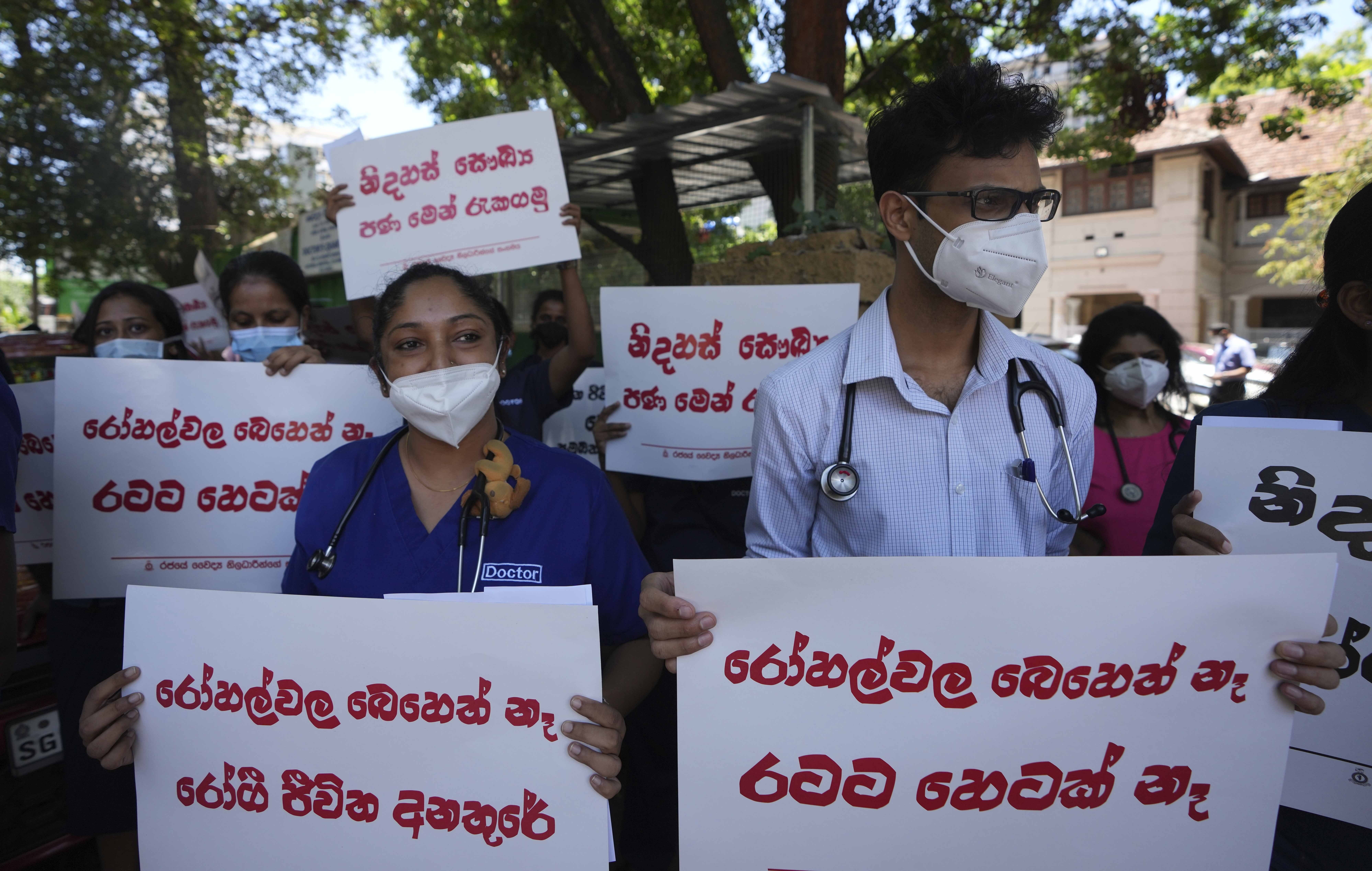 Sri Lankan government doctors protest against the government near the national hospital in Colombo, Sri Lanka, Wednesday, April 6, 2022.