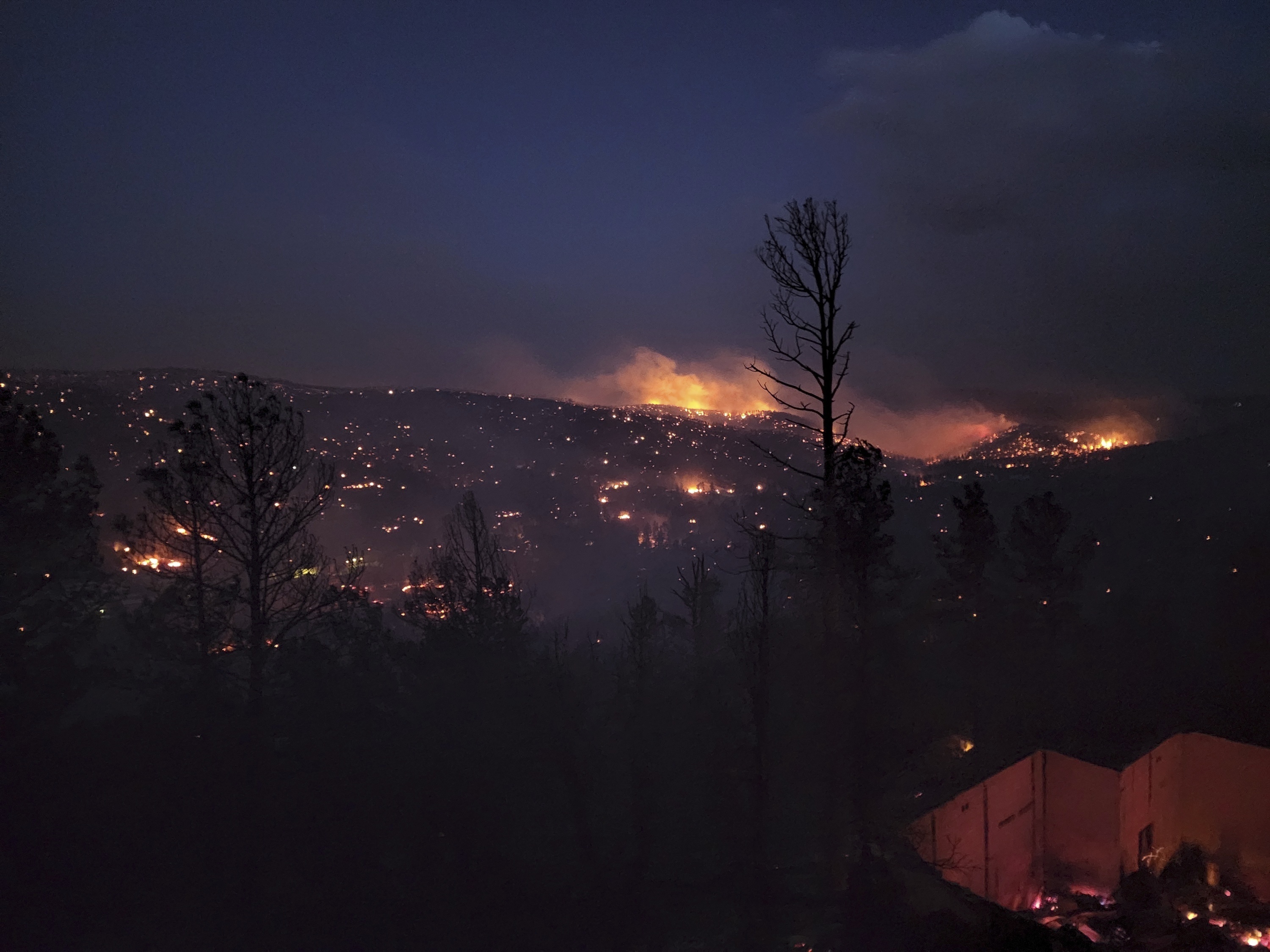 Fire burns along a hillside in the Village of Ruidoso, New Mexico, US