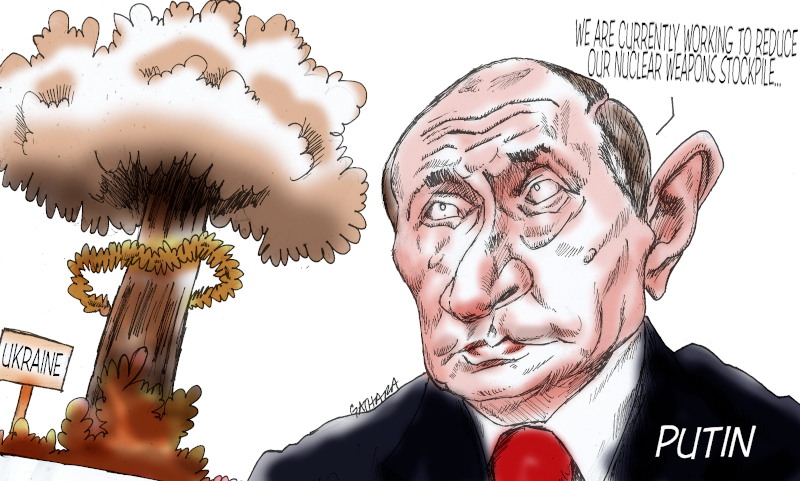 In the cartoon, Vladimir Putin says "We are currently working to reduce our nuclear weapons stockpile" while a mushroom cloud is seen over Ukraine in the background.